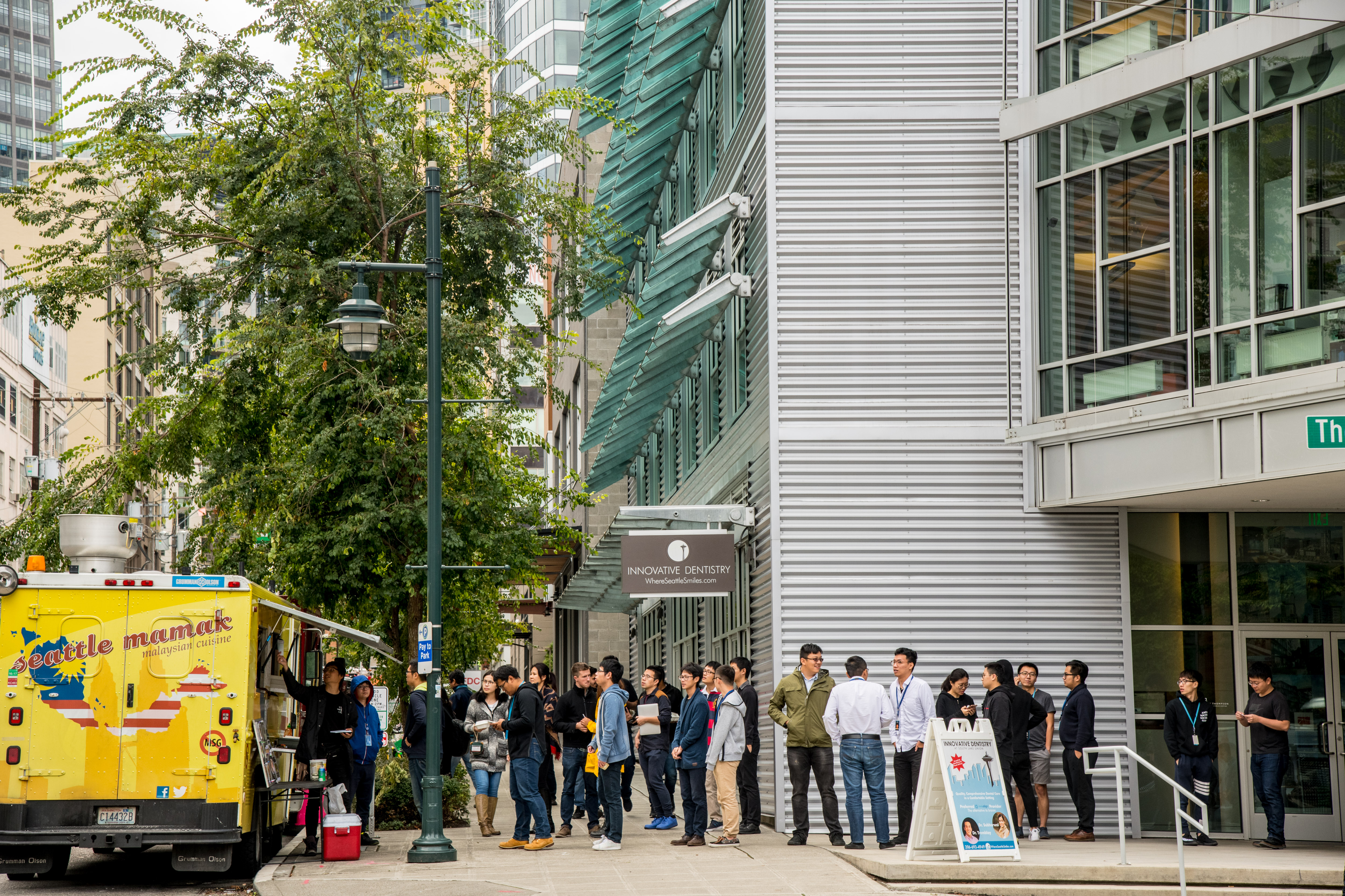Amazon employees stood in line for one of the many food trucks that descend daily to feed the thousands of the company’s workers.