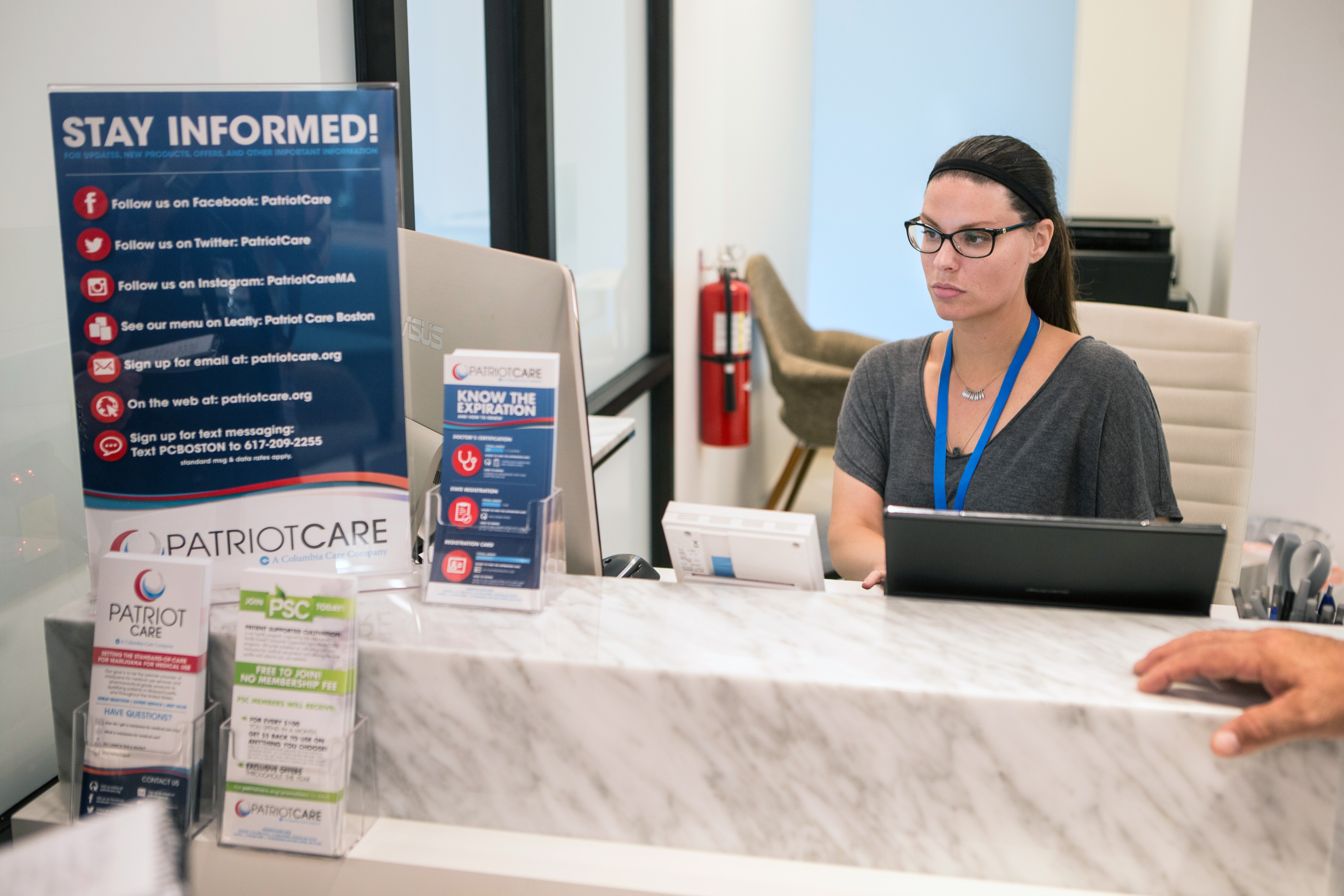 Amber Alagich, Patriot Care’s assistant general manager, was at work Tuesday preparaing the dispensary for its opening.