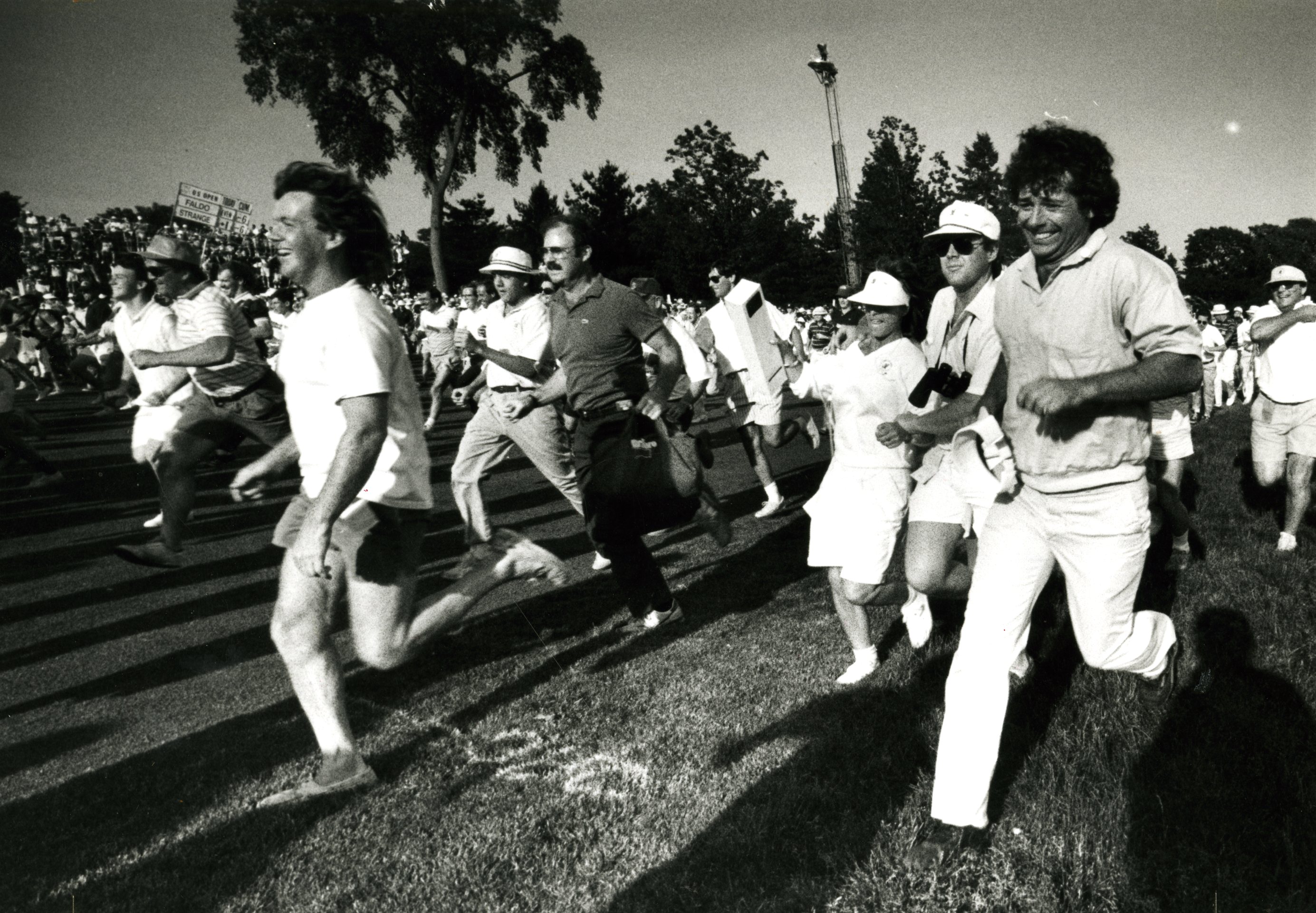 Fans rushed to grab a spot on the 18th green during the final regulation hole of the 1988 US Open. Curtis Strange and Nick Faldo finished four rounds tied, and went on to play an 18-hole playoff.