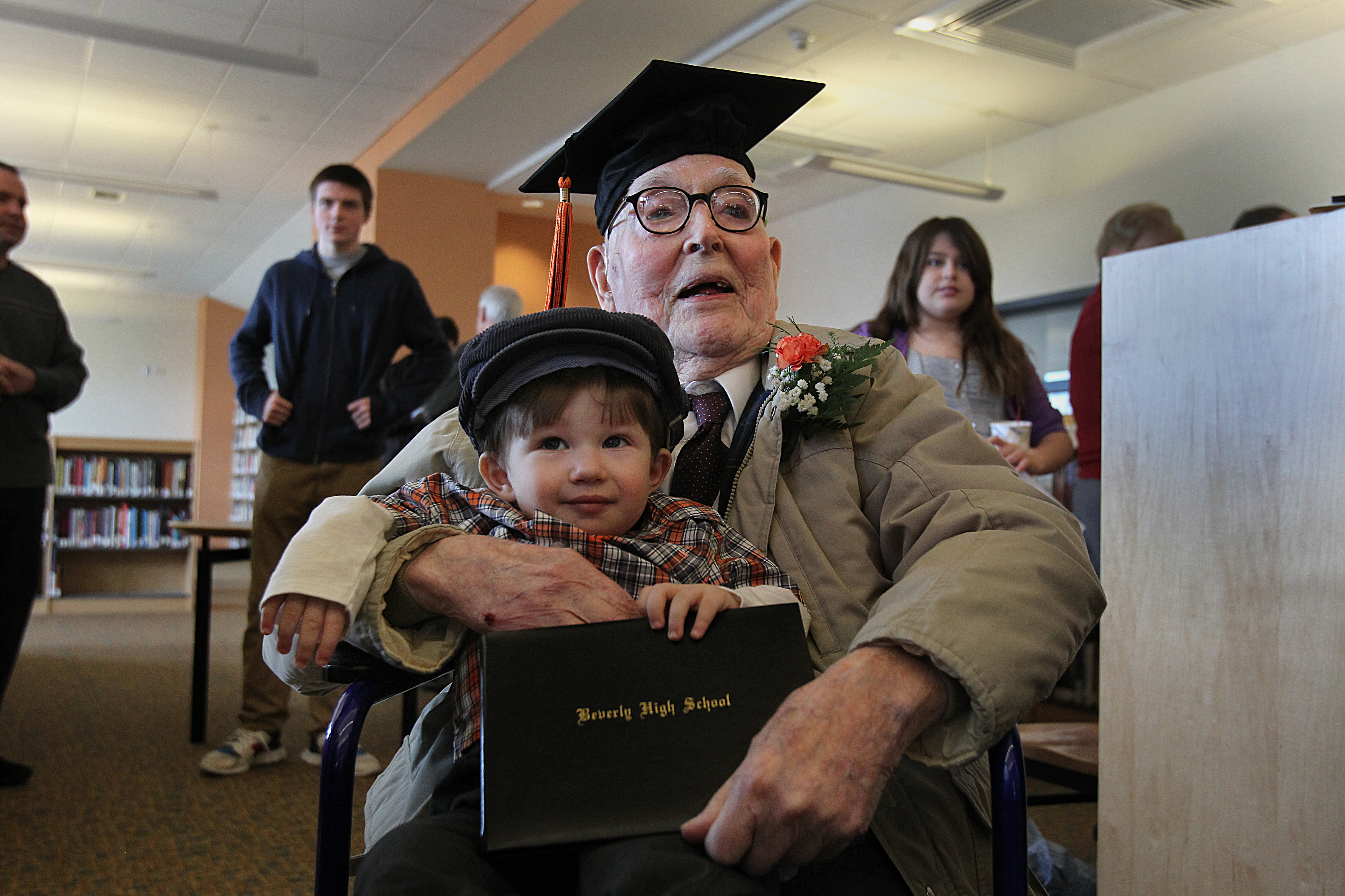 Fred Butler had to drop out of school after eighth grade to help support his mother and five younger siblings. Among those attending his diploma ceremony was his great-grandson Matthew Calabro.