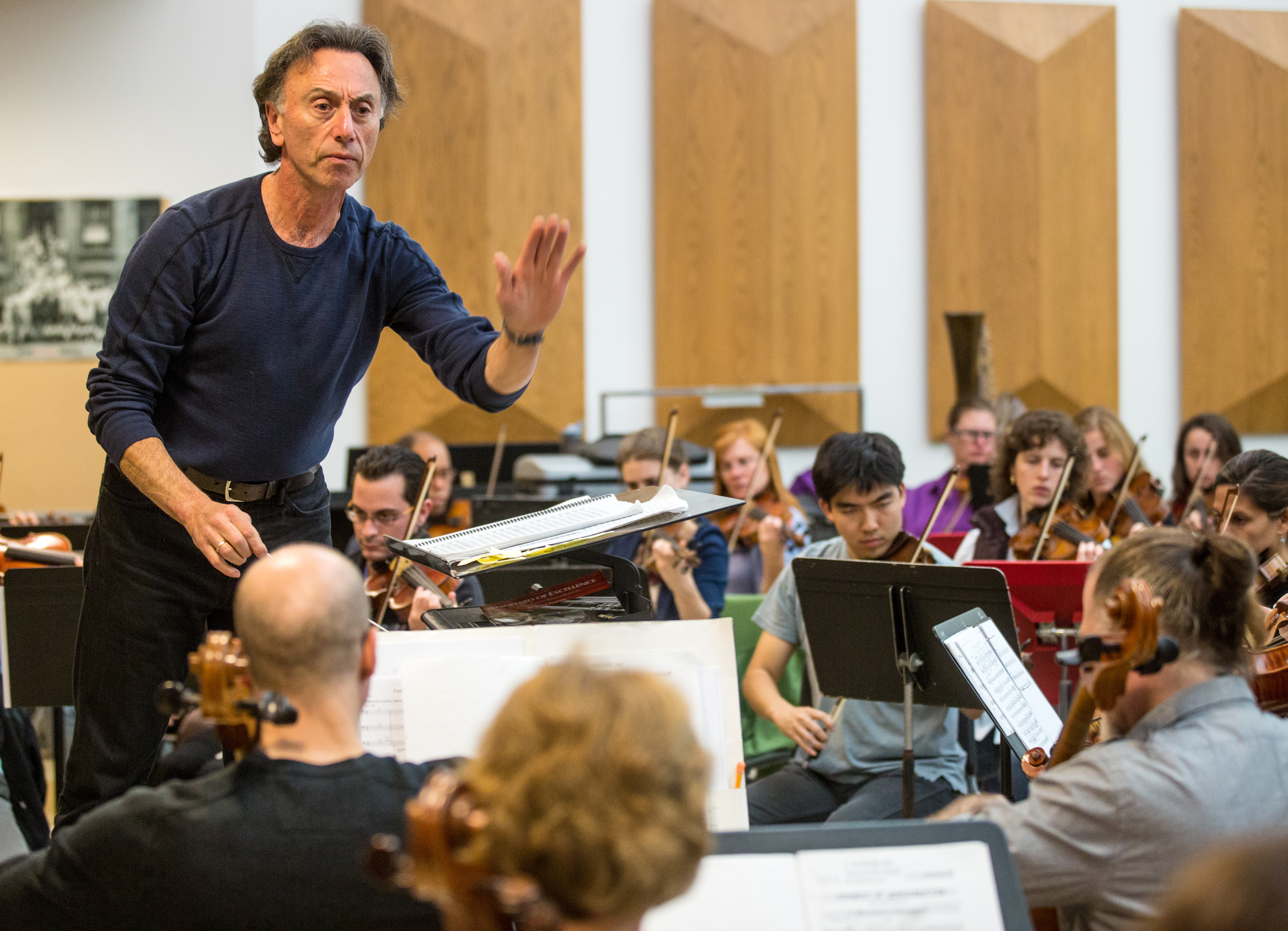 New music director Ronald Feldman rehearses the Longwood Symphony Orchestra at the Boston Latin School this week.