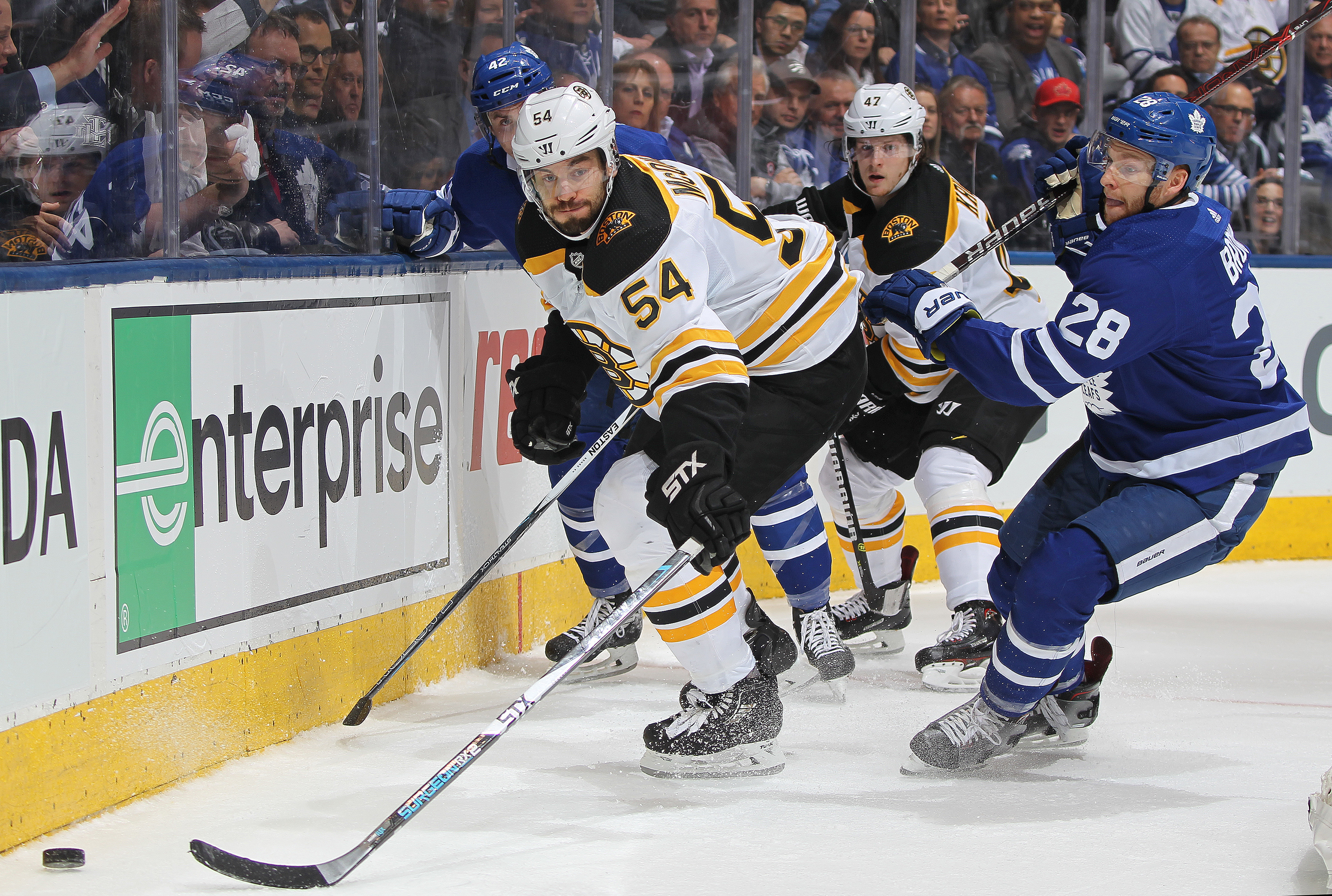 After Adam McQuaid was traded to the Bruins on Tuesday, many teammates who played with him on the 2011 Stanley Cup-winning squad remembered him fondly.