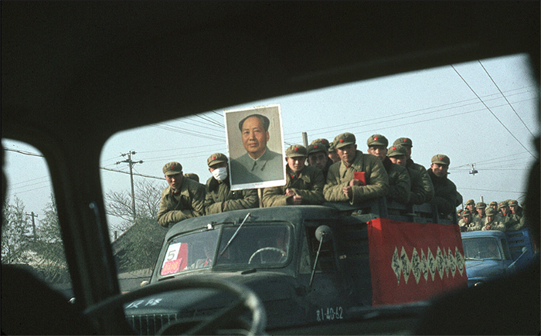 Military trucks on their way to a demonstration.