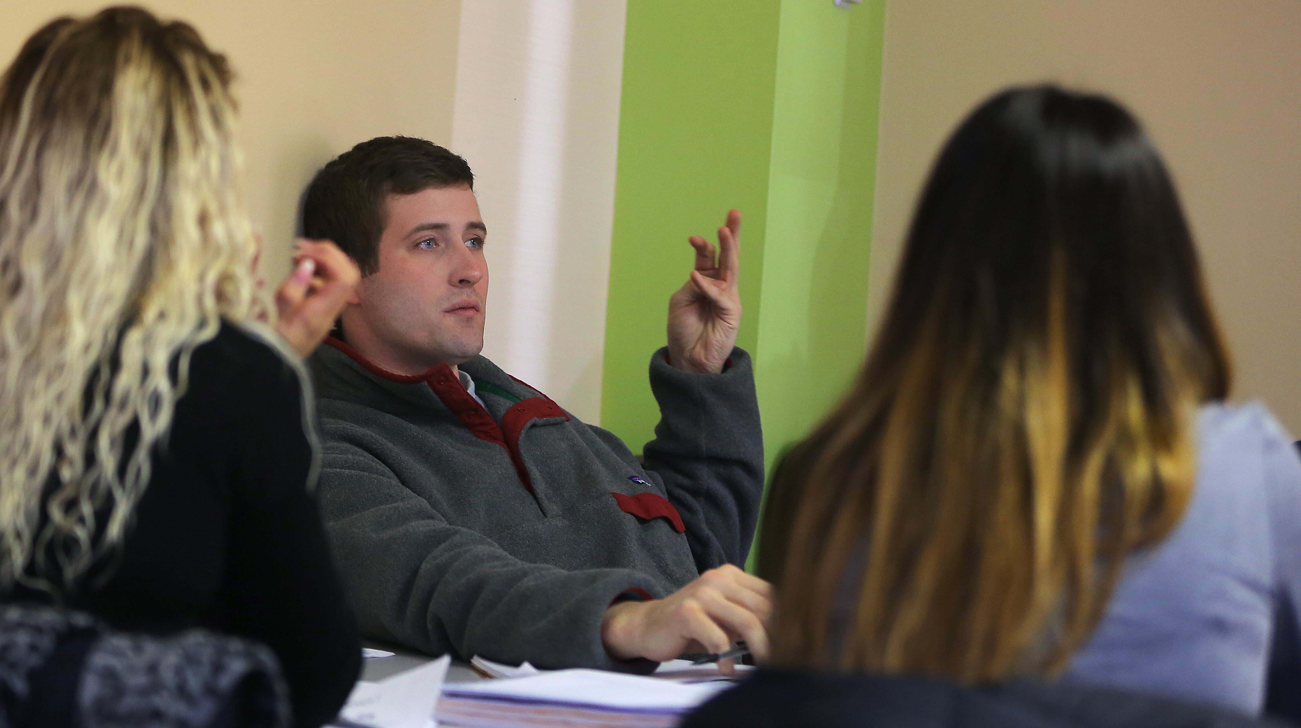Nicholas Salerno participates in a class at Framingham State University's Entrepreneur Innovation Center.