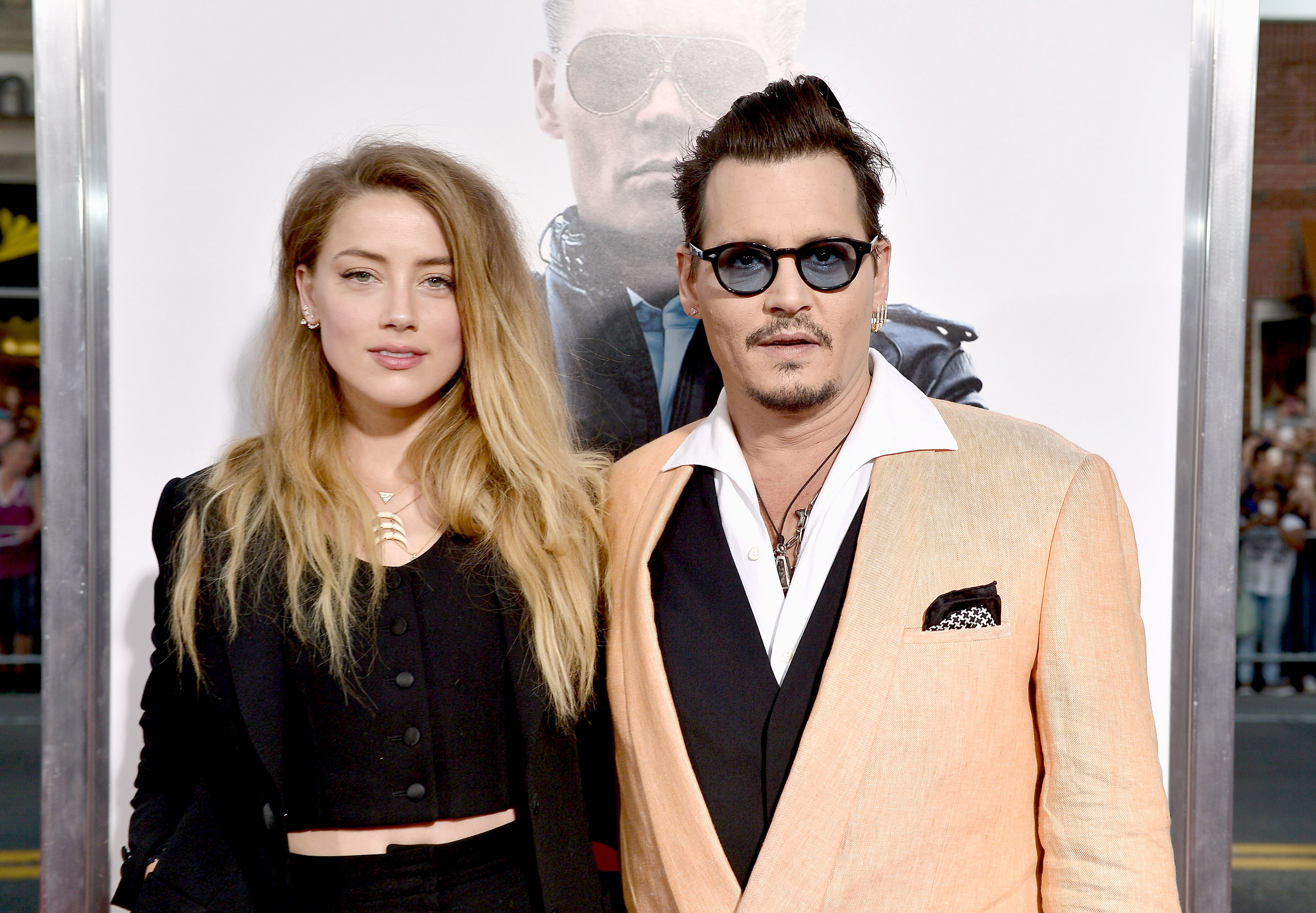 Amber Heard (left) and Johnny Depp attended the "Black Mass" screening at the Coolidge Corner Theatre in Brookline on Sept. 15.