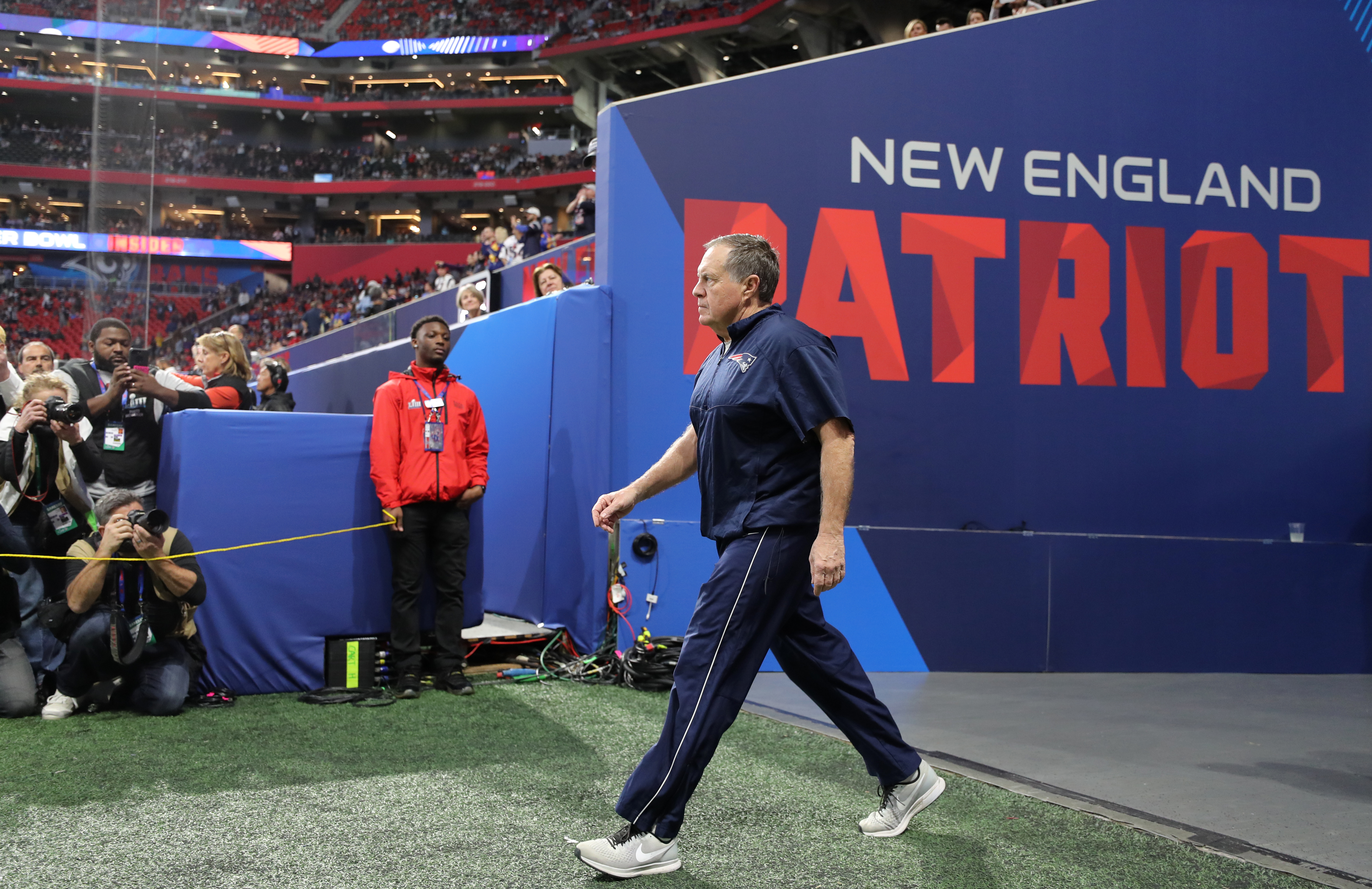 Bill Belichick took the field before the game.