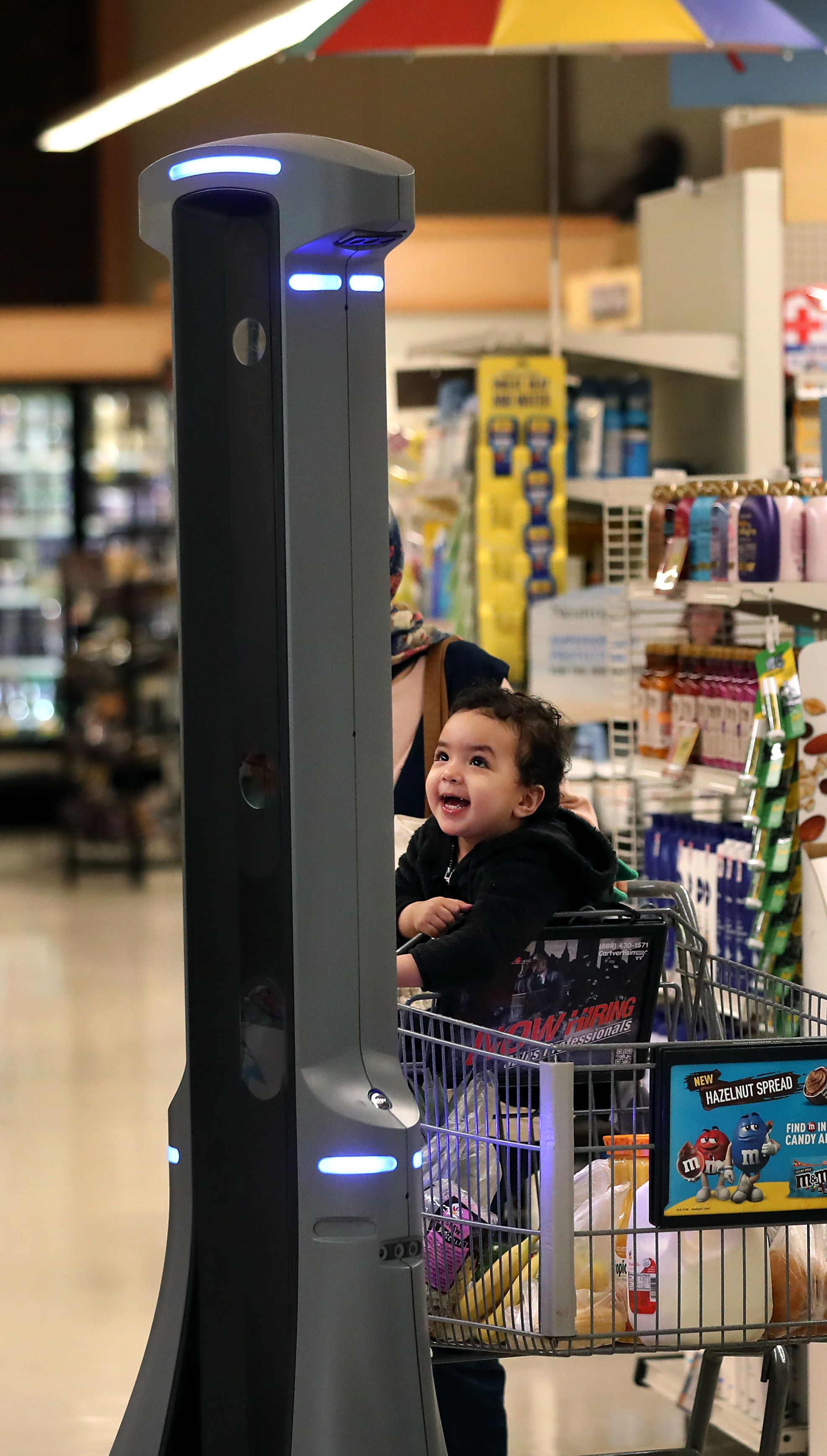 Amir Aitbouqdir was all smiles after encountering Marty the robot while his mother, Souaad El Ghabouchi, shopped at Stop & Shop in Quincy.