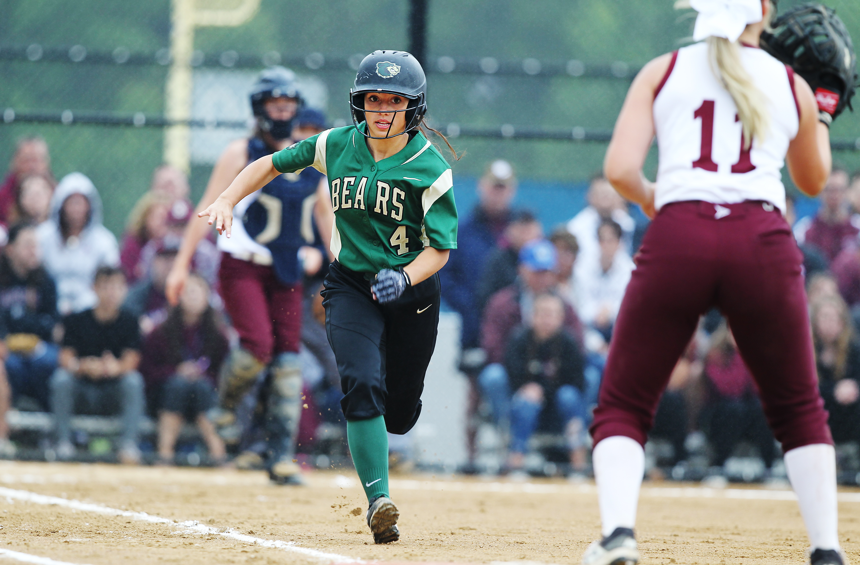 Greater New Bedford’s Sarah Carvalho tries to beat out a ground ball during the Bears’ win.