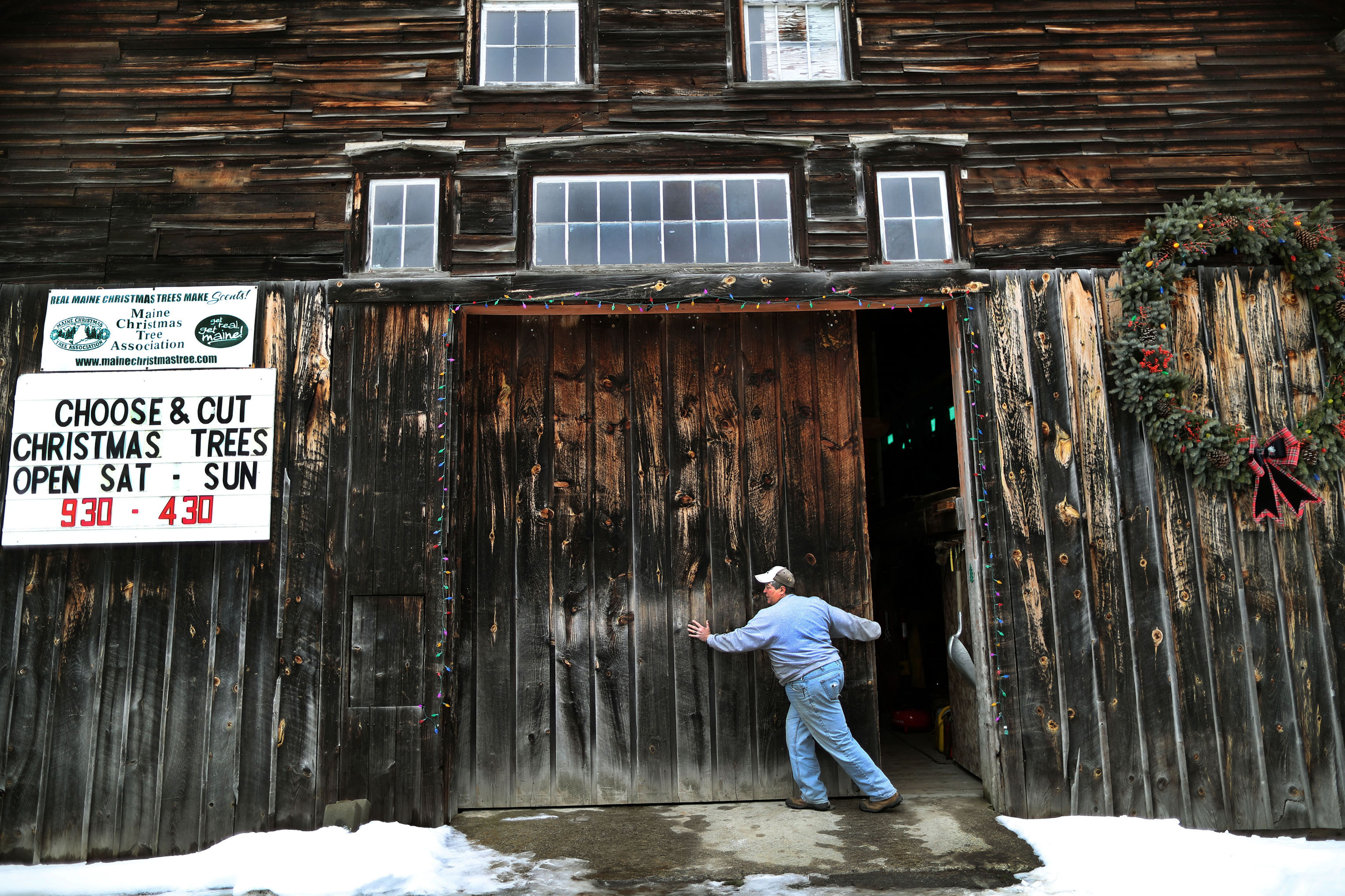 Mary Pearson opened the door to the barn where Jim's tractor is kept inside in January.