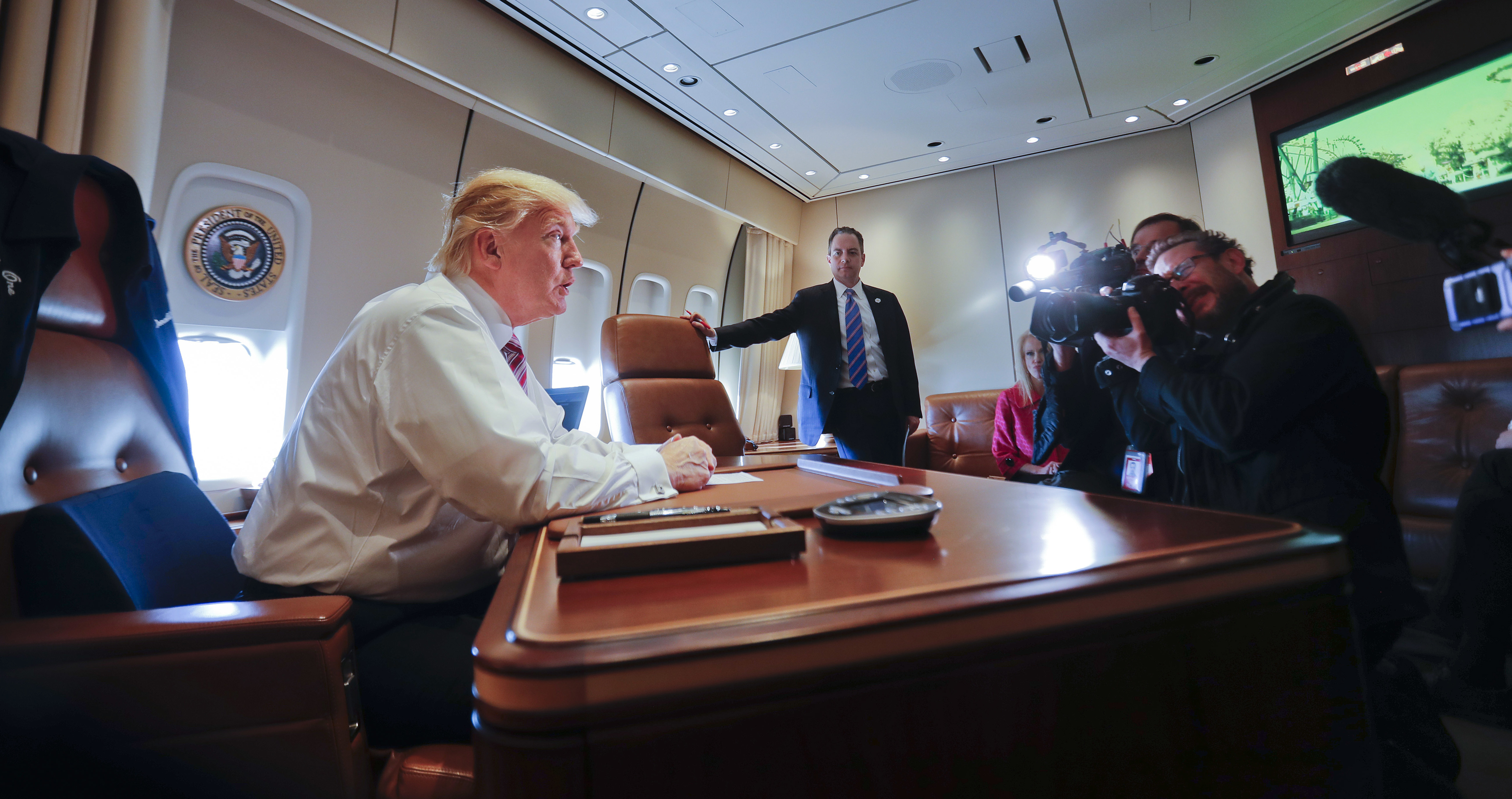 President Donald Trump sat his desk on Air Force One upon his arrival at Andrews Air Force Base Thursday.