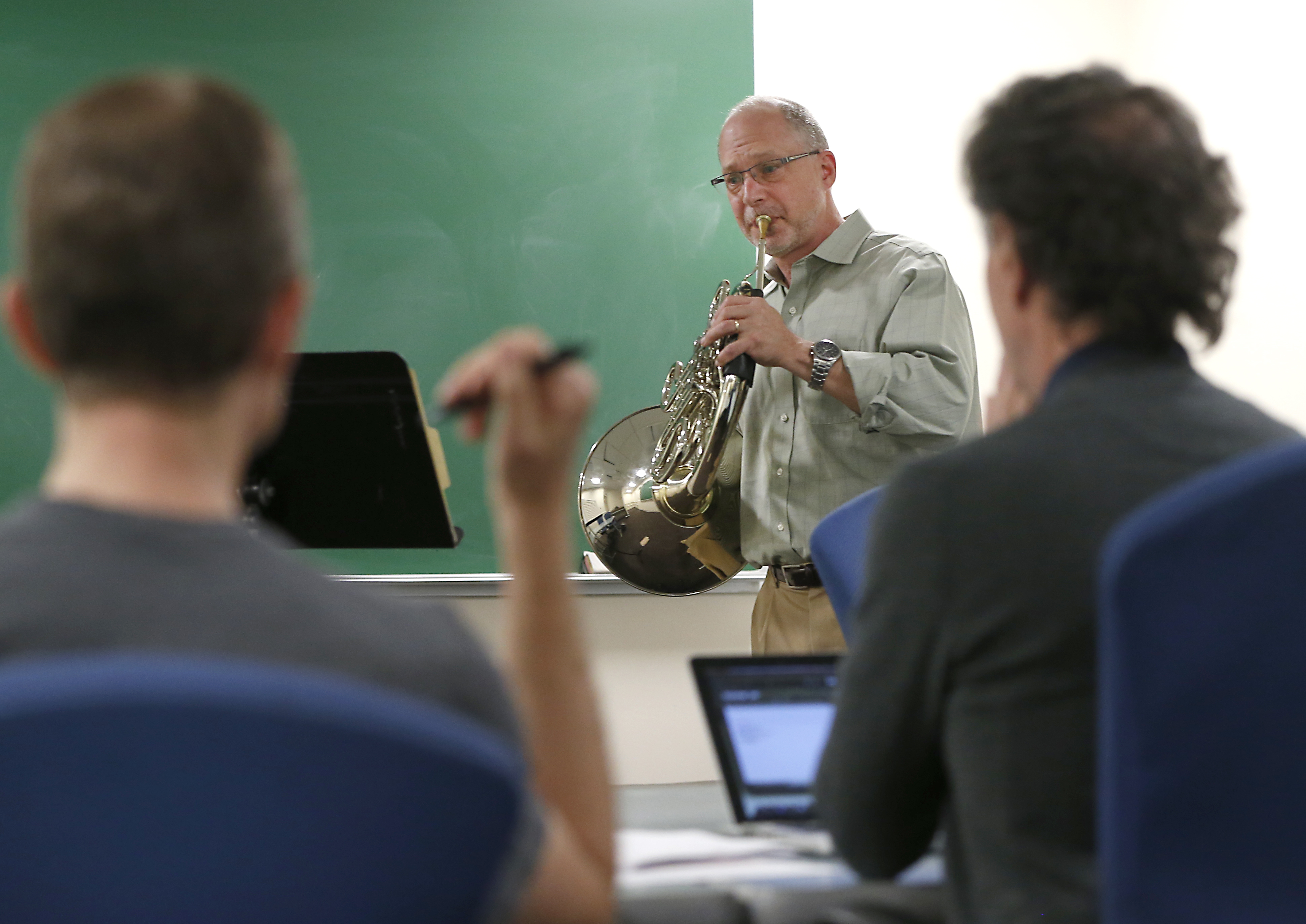 Phil Gotwals auditioned for the Longwood Symphony Orchestra in front of Jeremy Lang (left) and conductor Ronald Feldman.