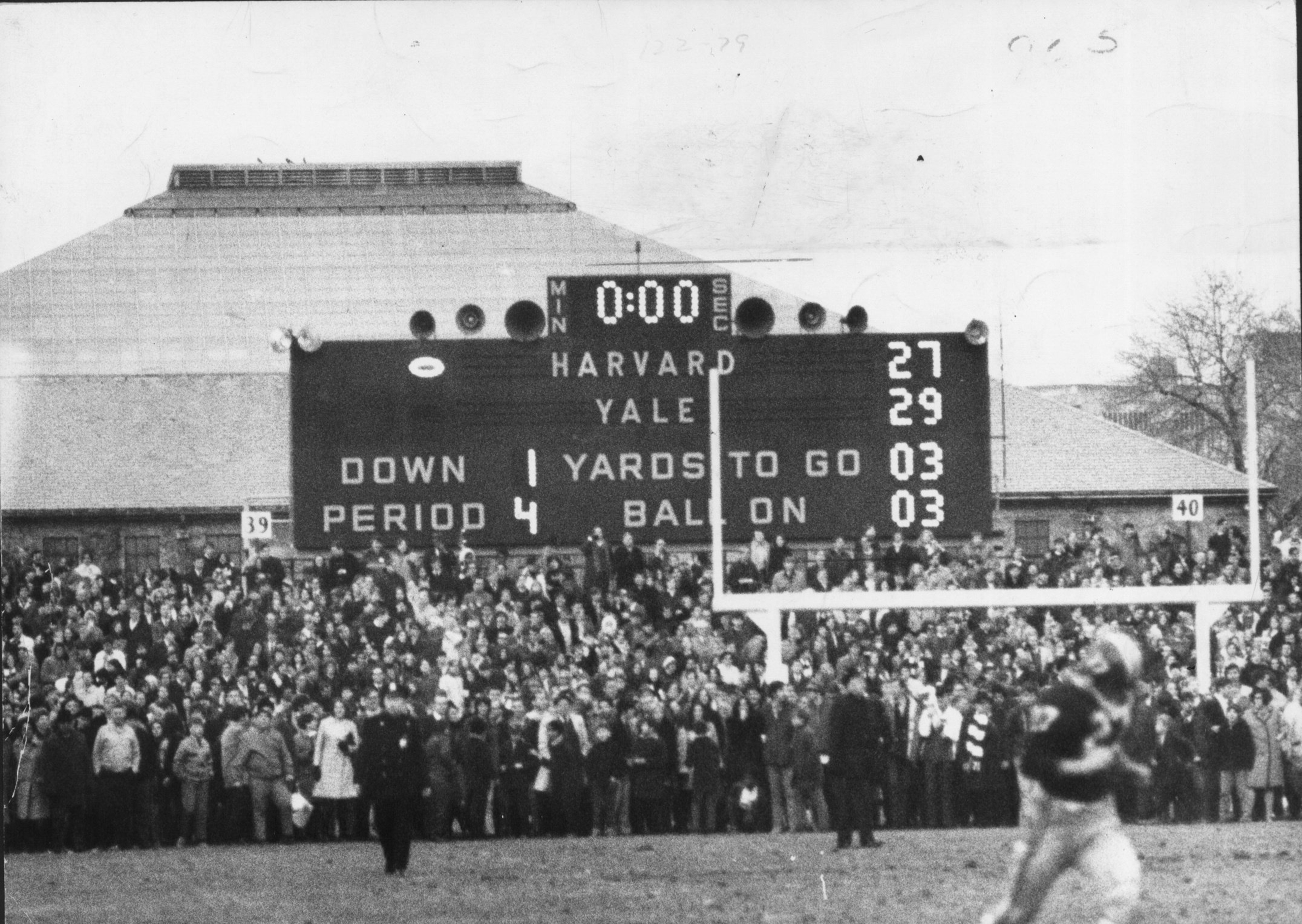 The scoreboard in Harvard Stadium documents the implausible comeback.