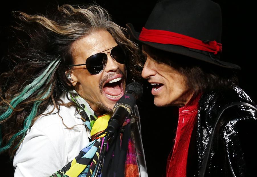 Steven Tyler and Joe Perry sang together as Aerosmith played at the Xfinity Center.
