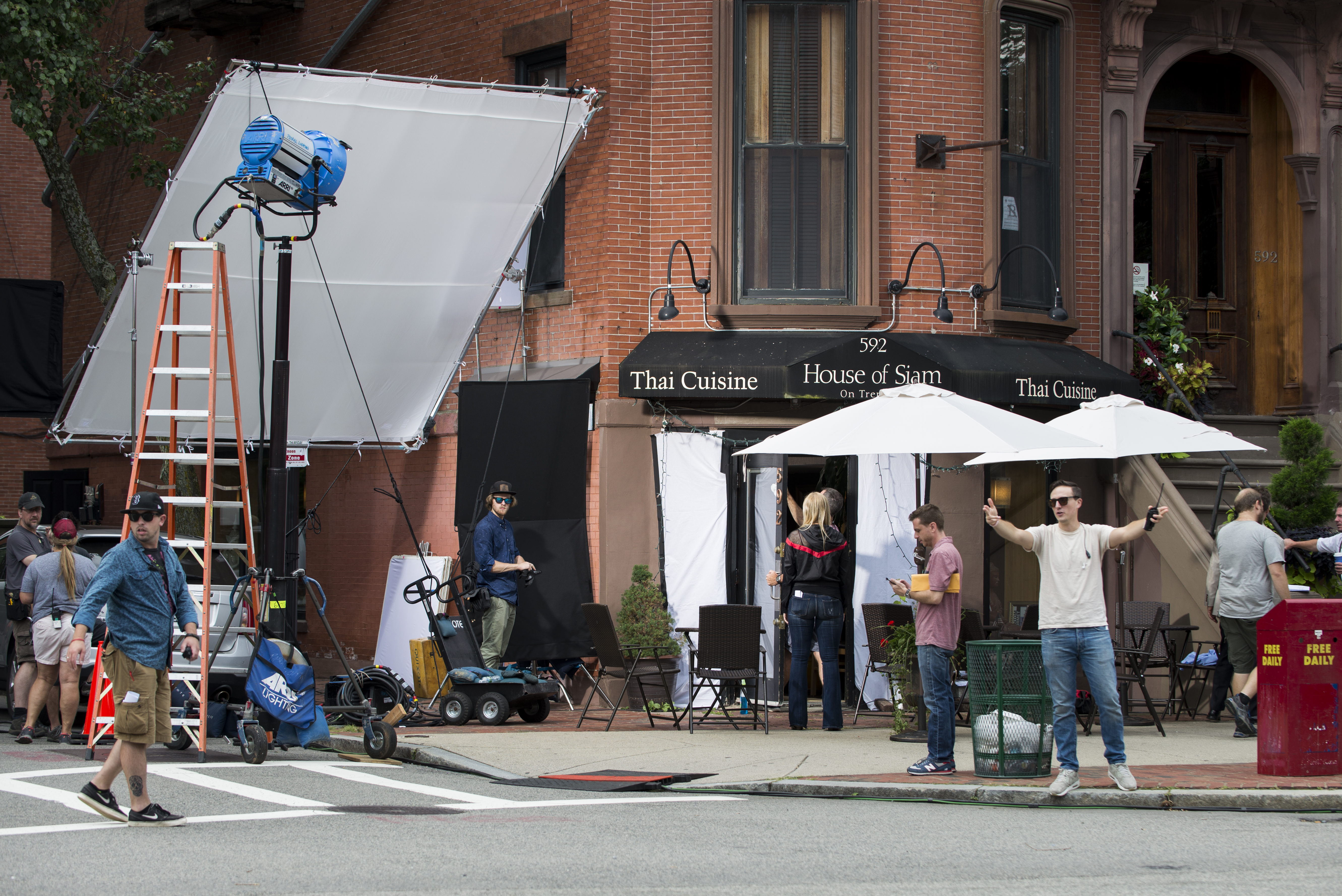 Production crews set up outside the House of Siam on Tremont Street.