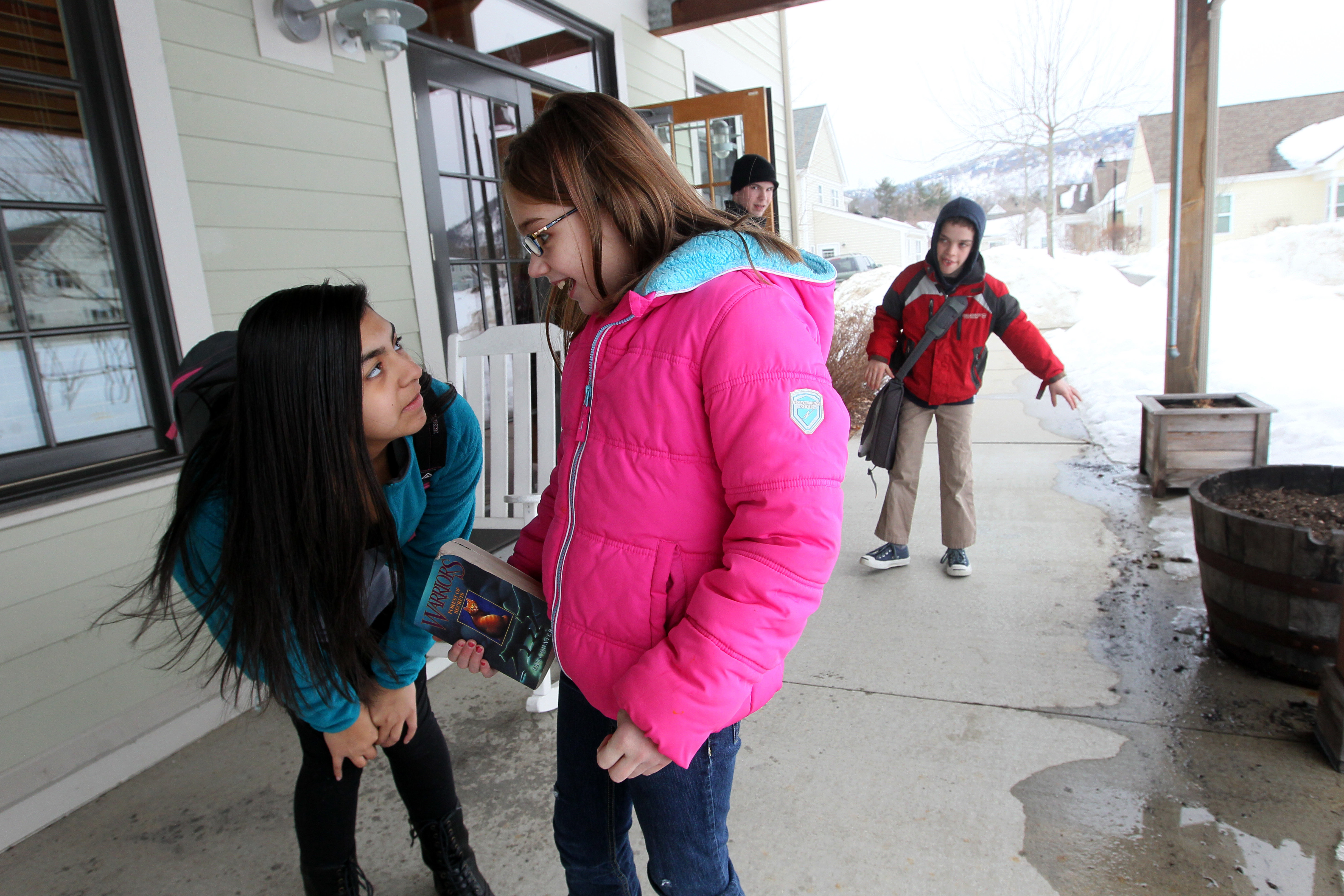 Tanisha Gannett,13, and Ashlynn Rubio, 10, adopted children from different families, connected after school at the Treehouse community center.
