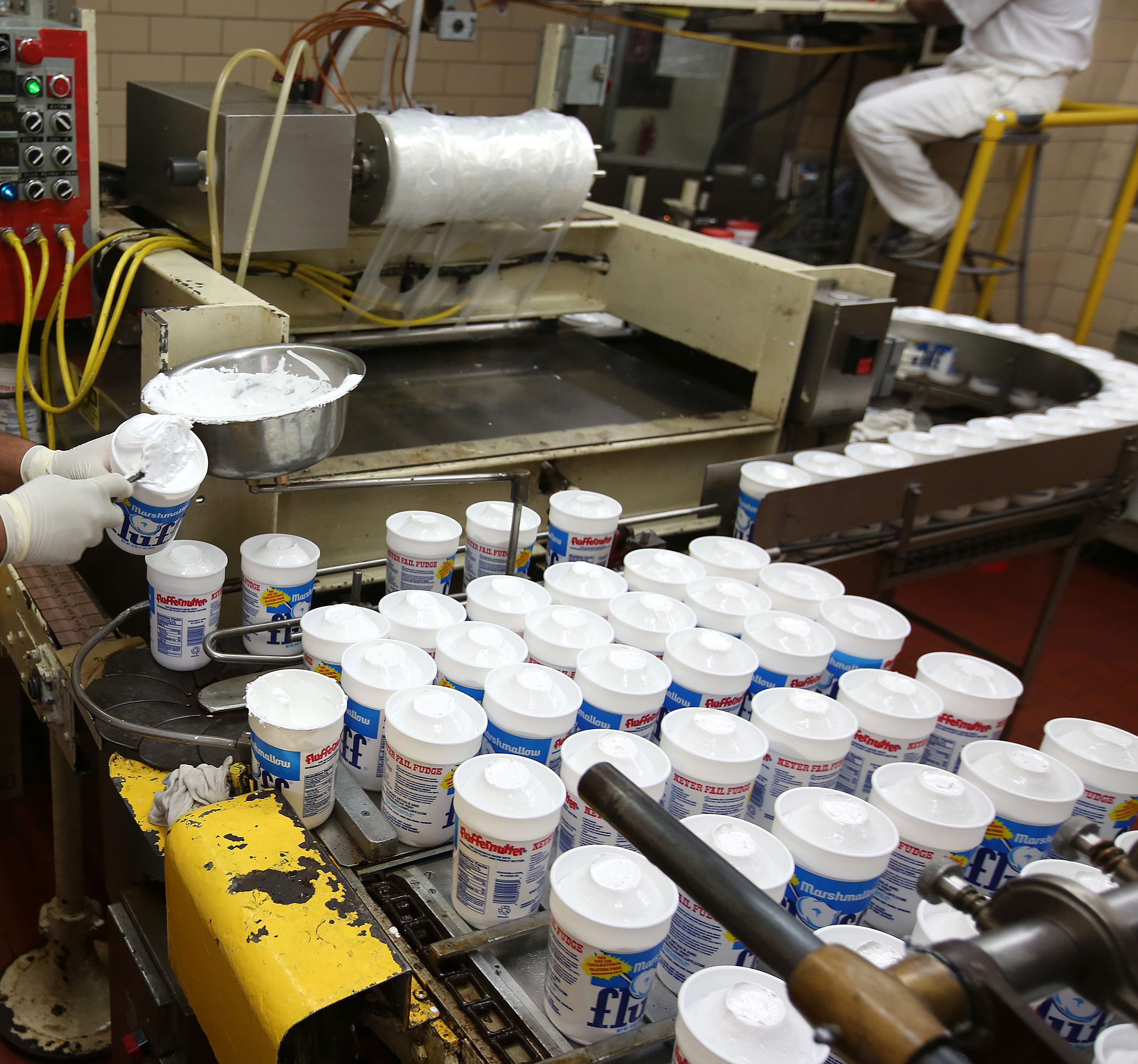 Employees worked in the filling room.