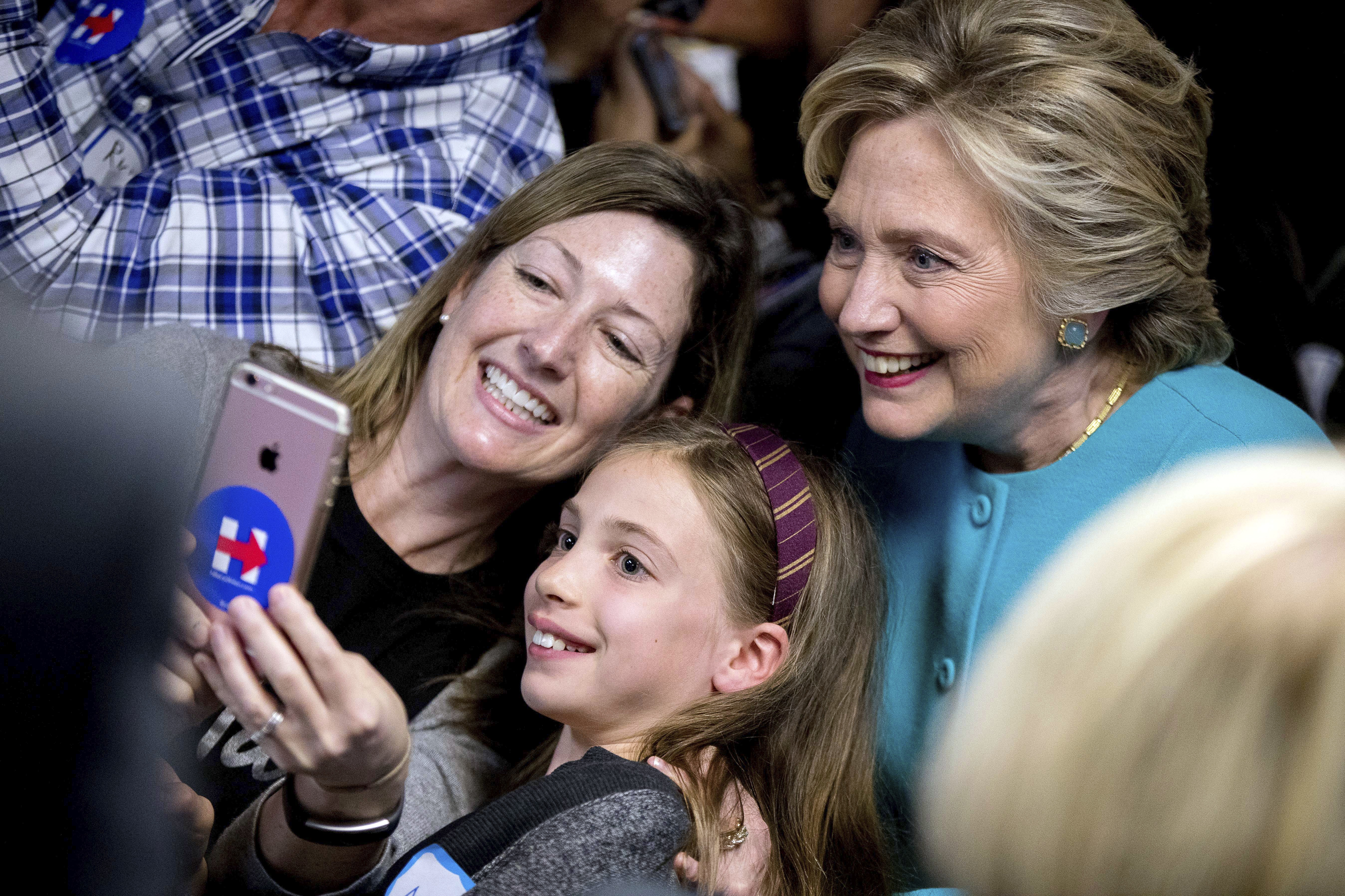 Clinton took a photograph with supporters at a campaign office in Seattle.
