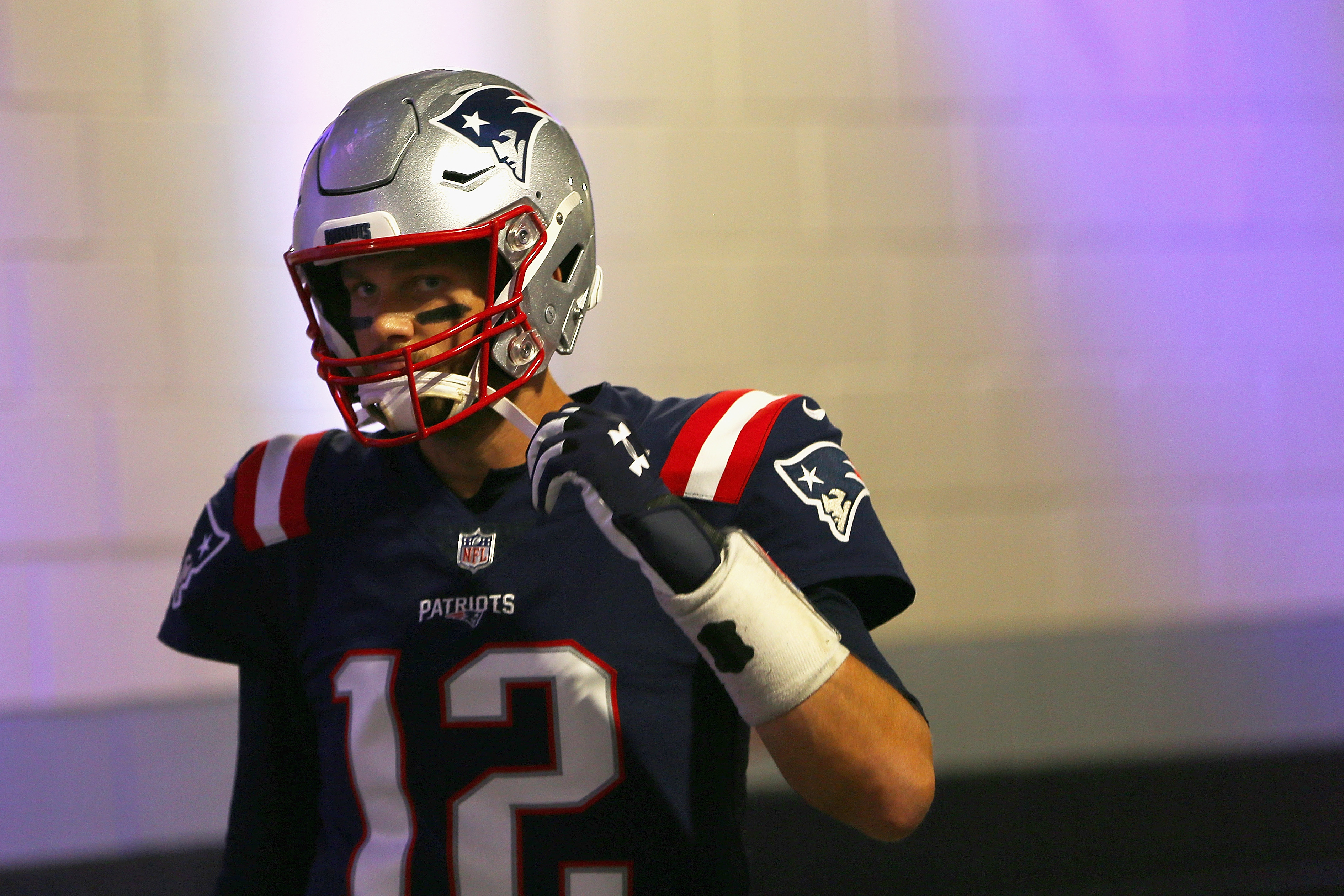 Brady walks through the tunnel before the game.