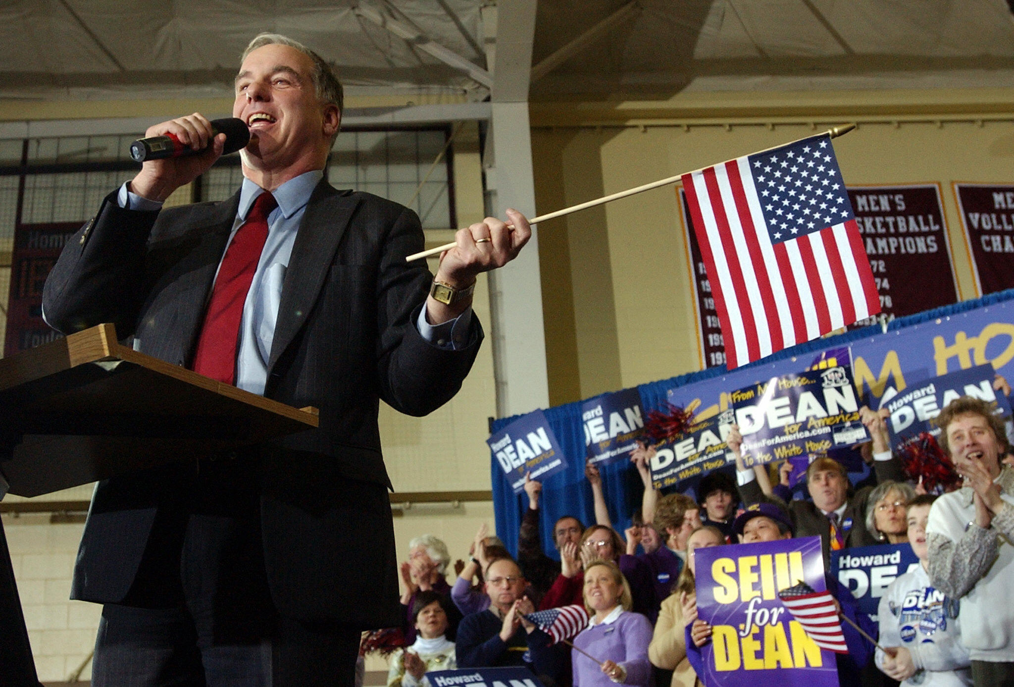 Howard Dean waved an American flag during a rally in Manchester, N.H., in 2004.