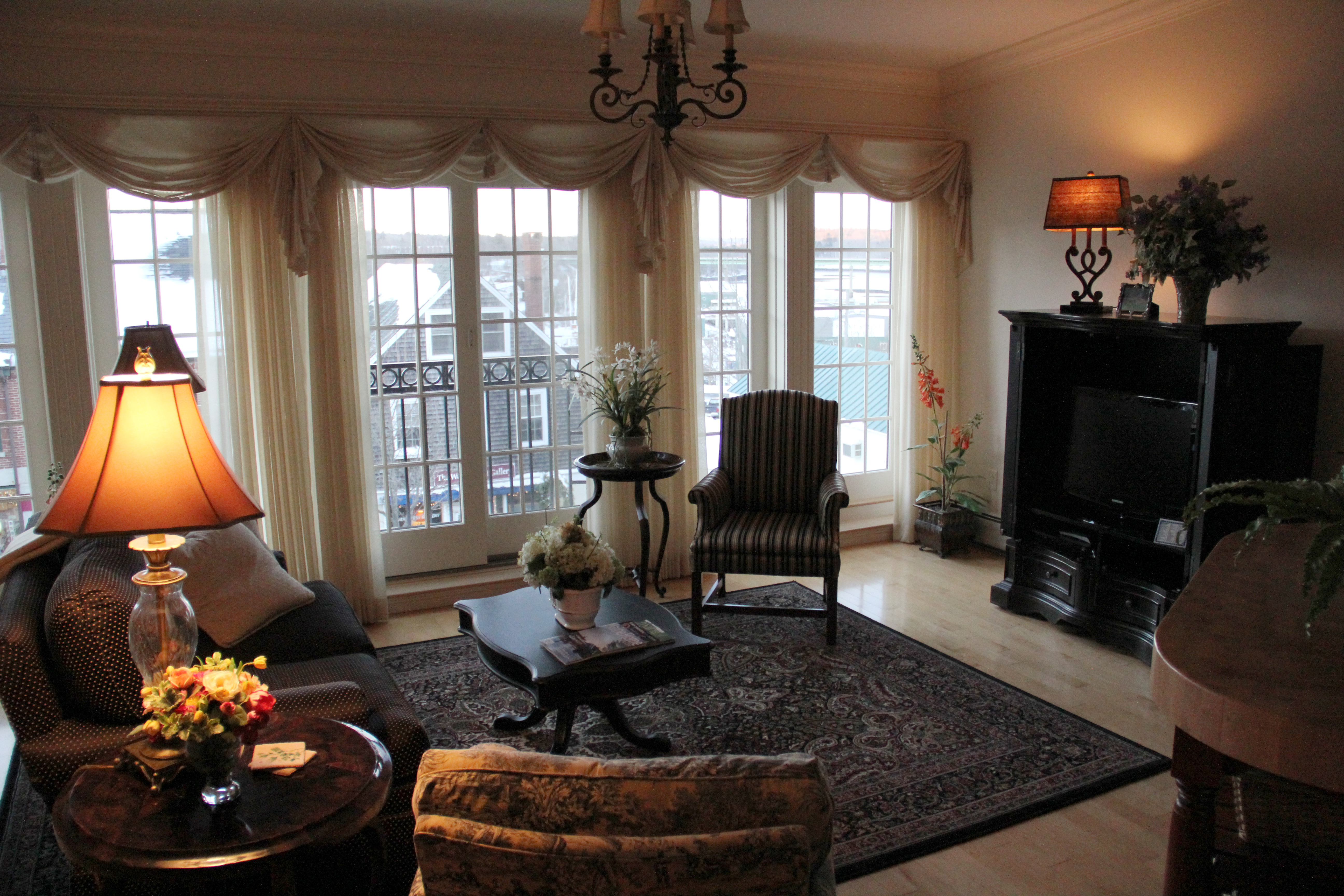 Living room in a guest suite with water views, Belfast Bay Inn.