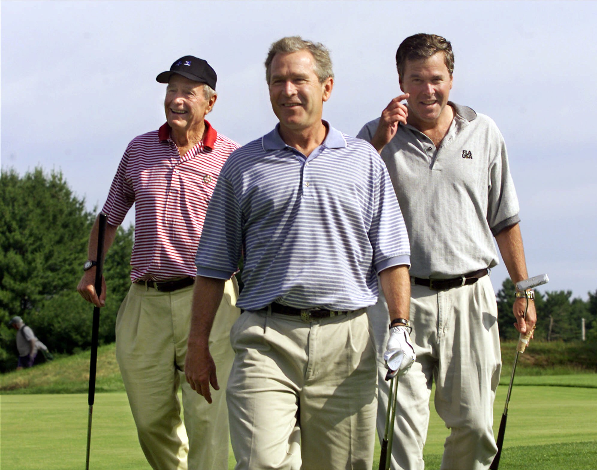 Like his father, Jeb Bush is an unusually speedy golf player. Pictured: George W. Bush, George H.W. Bush, and Jeb Bush at the Cape Arundel Golf Club in Kennebunkport, Maine, in 2001.