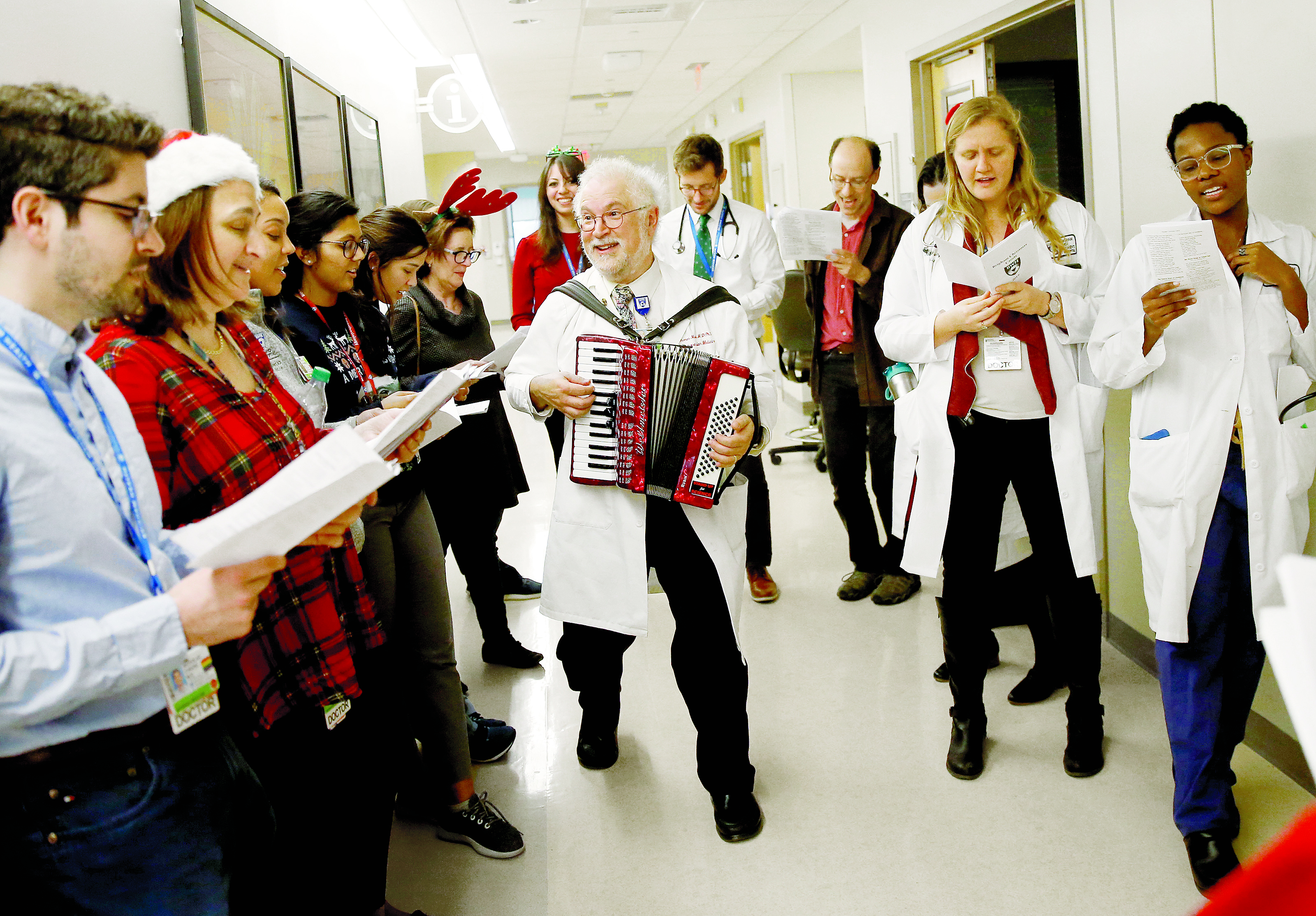 Dr. Michel accompanied the Cardiotonic singers on the accordion. The Cardiotonics have been caroling at Brigham and Women’s Hospital for eight years running.