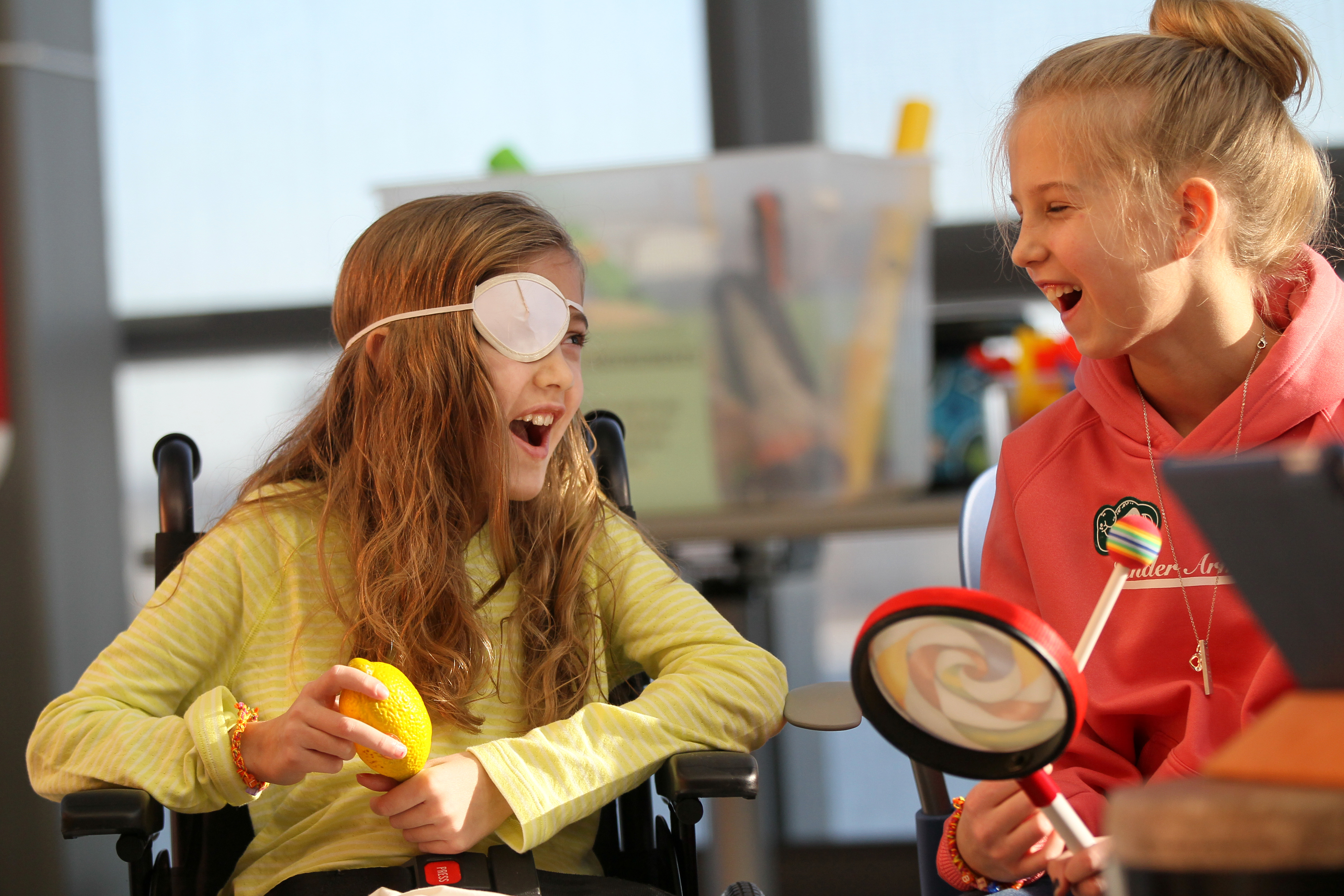 Sophie Fellows and her sister Lucy sang Katie Perry’s “Roar” during a group music therapy session Thursday at Spaulding Rehabilitation center.