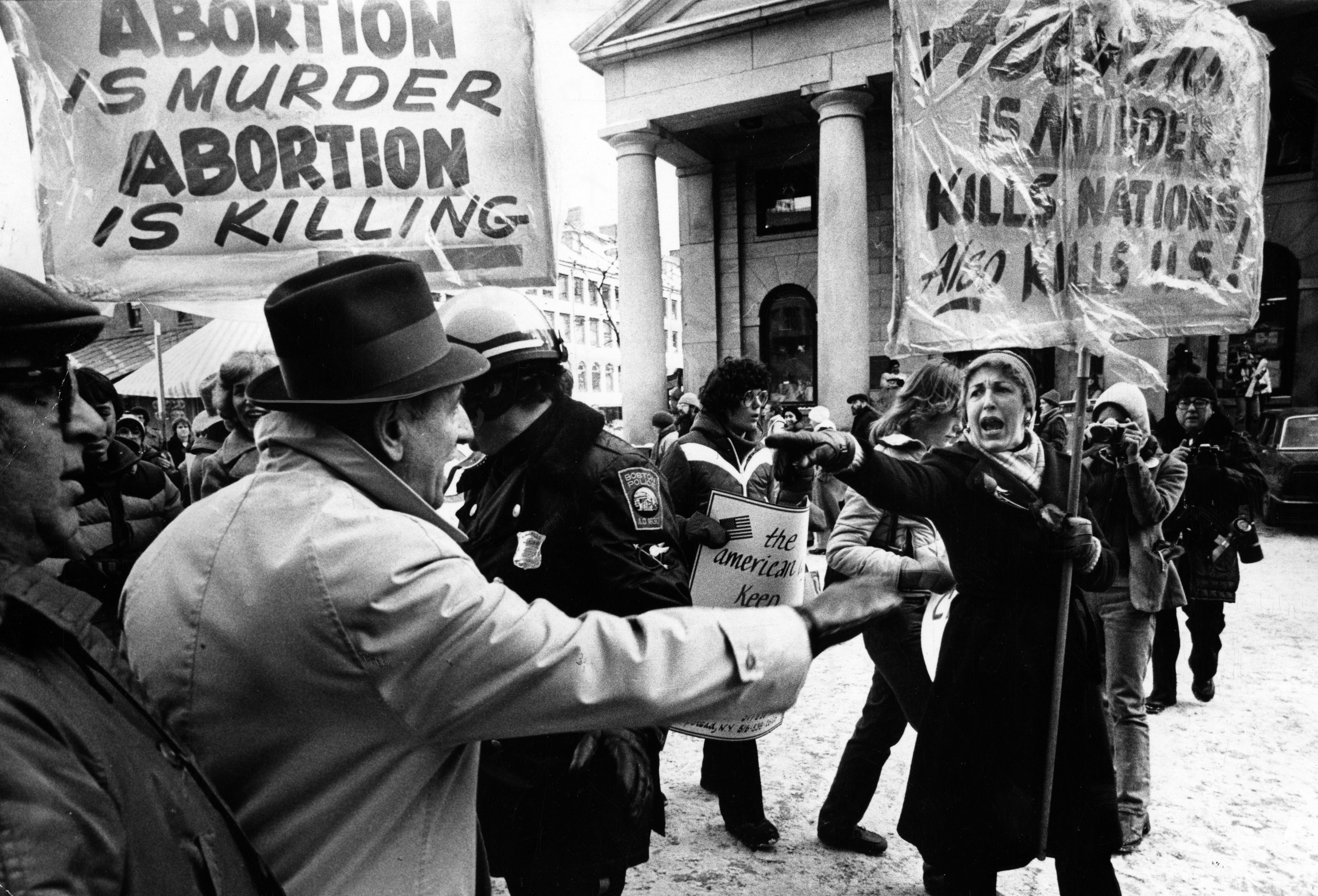 Anti-abortion advocates and abortion rights protesters clashed in front of Faneuil Hall in Boston on Jan. 18, 1981.