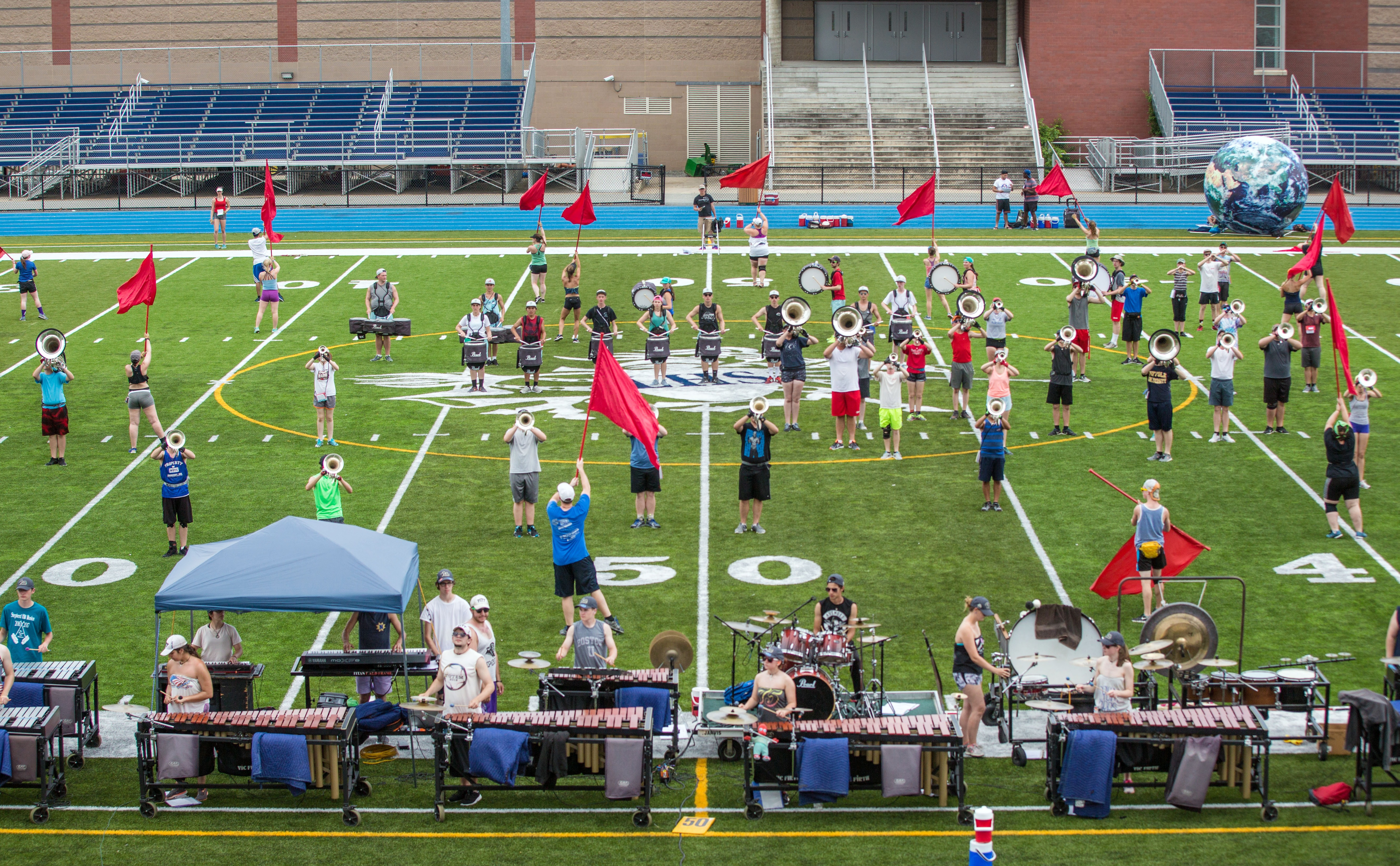 Members of the Spartans drum and bugle corps filled the field at Veterans Memorial Stadium in Lawrence.