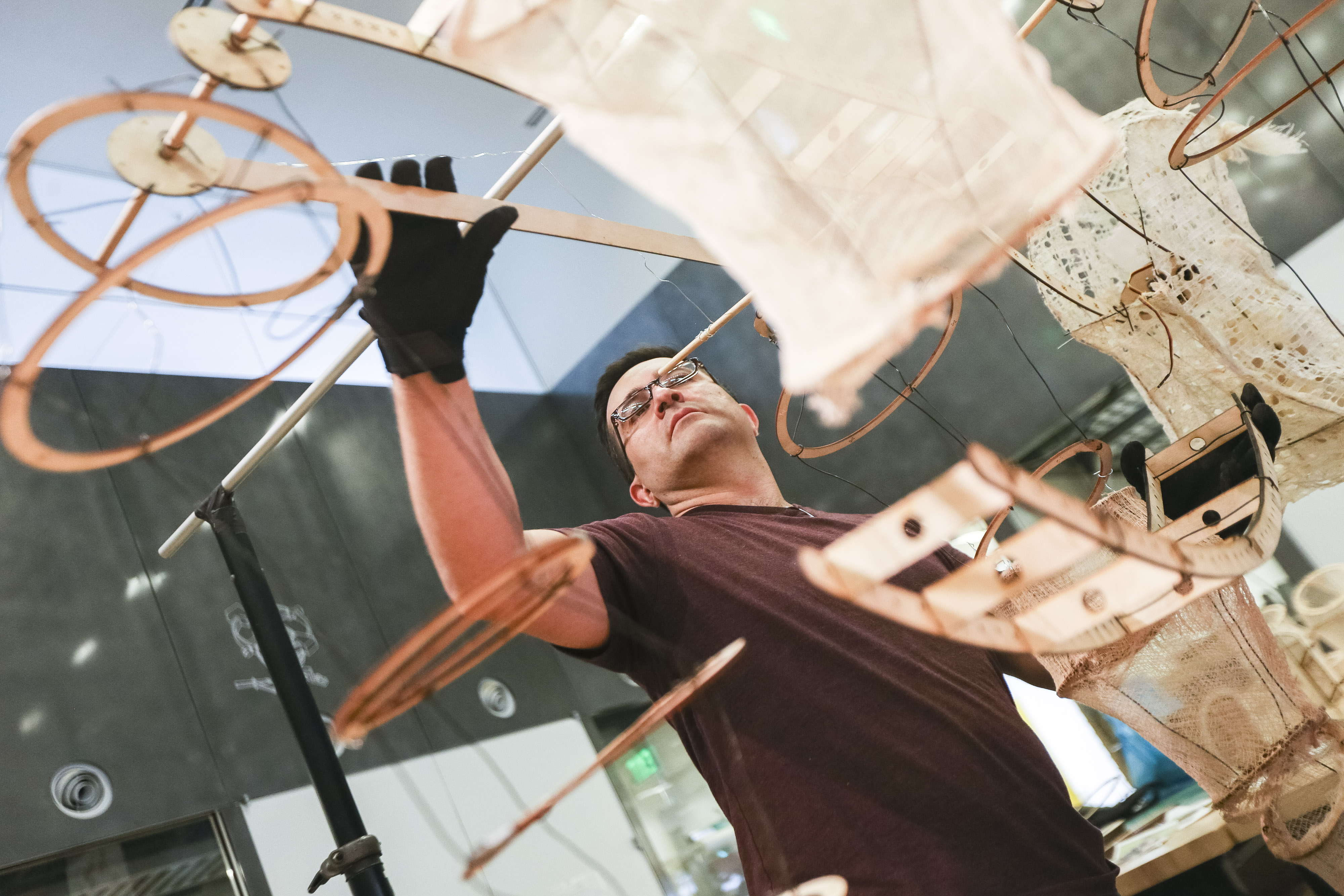 David Nuñez made adjustments on his “Requiem for Rhinoceros” installation at the MIT media lab. The work commemorates the last of the nearly extinct Northern white rhinos.