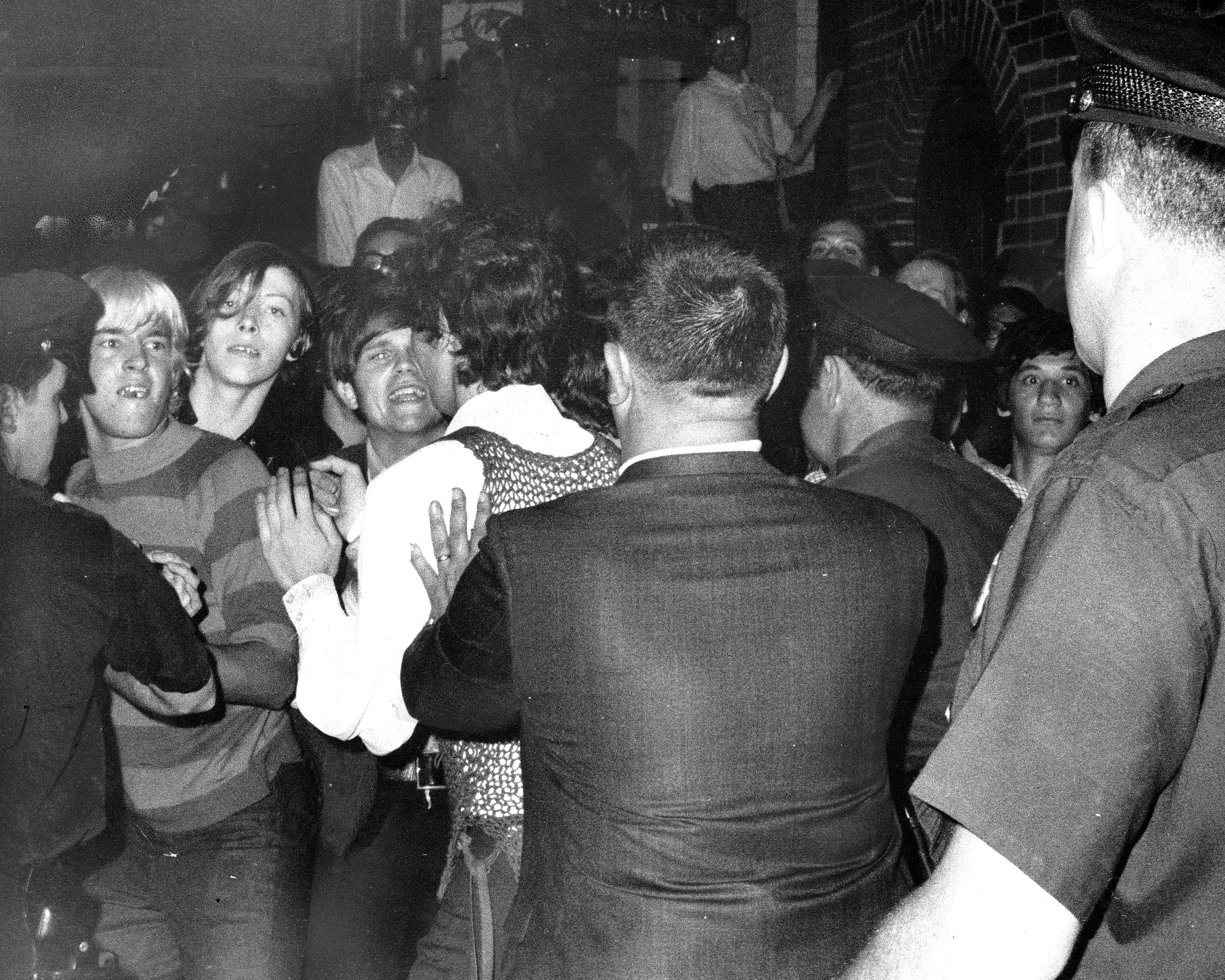 Crowds and police confronted each other outside the Stonewall Inn in 1969.