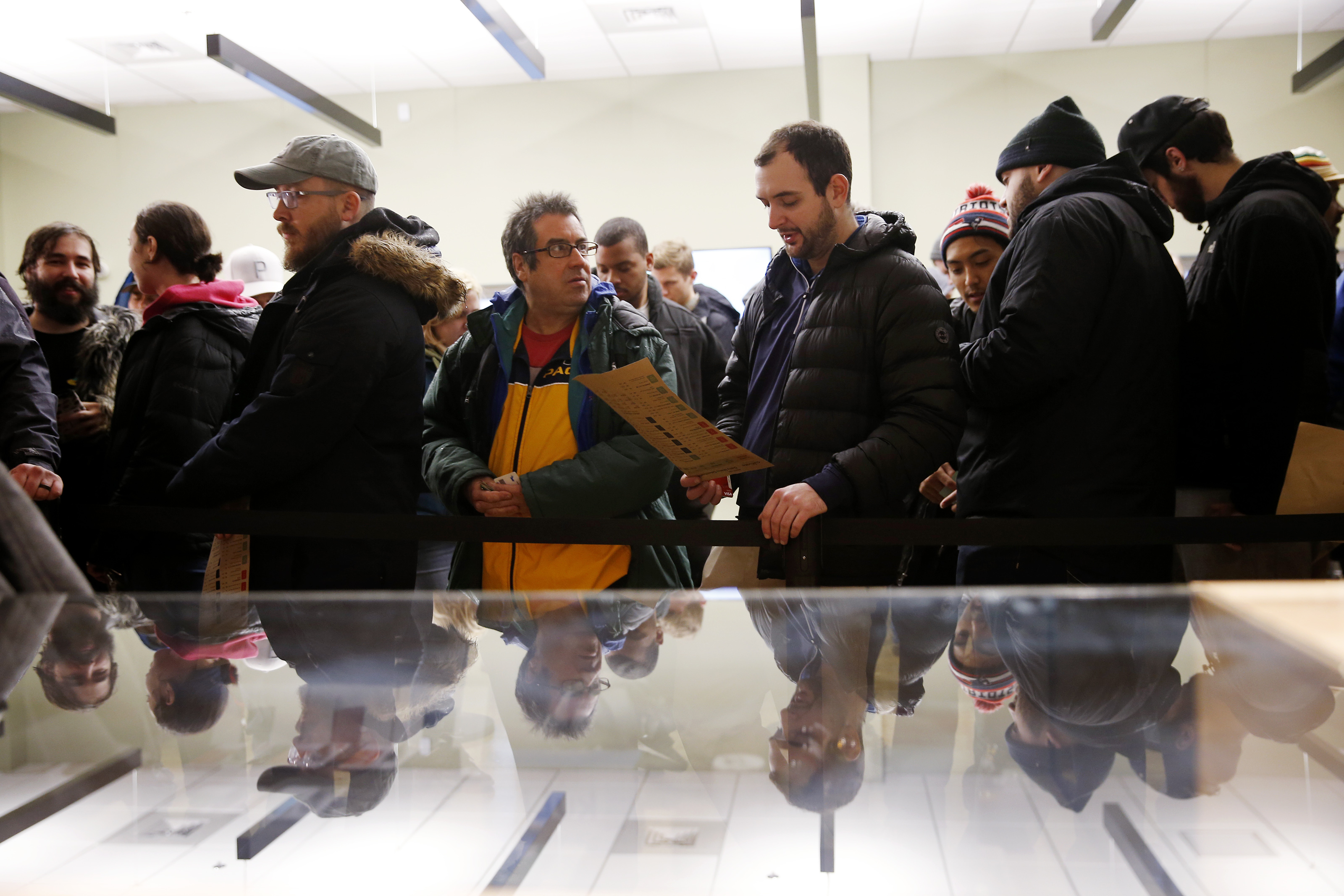 People waited in line inside the Leicester store.