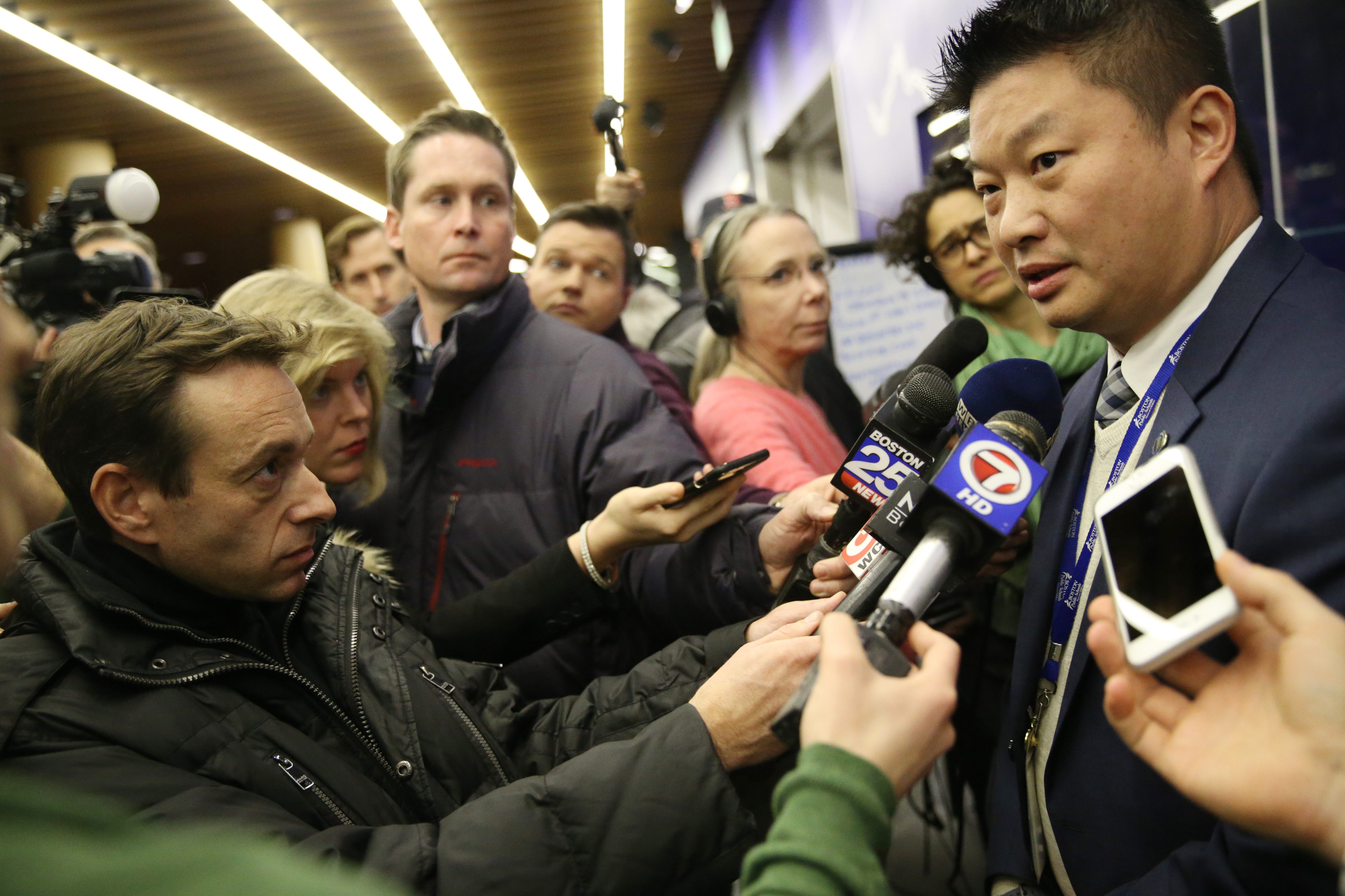 Dr. Tommy Chang seeked to the media before a Boston School Committee meeting.