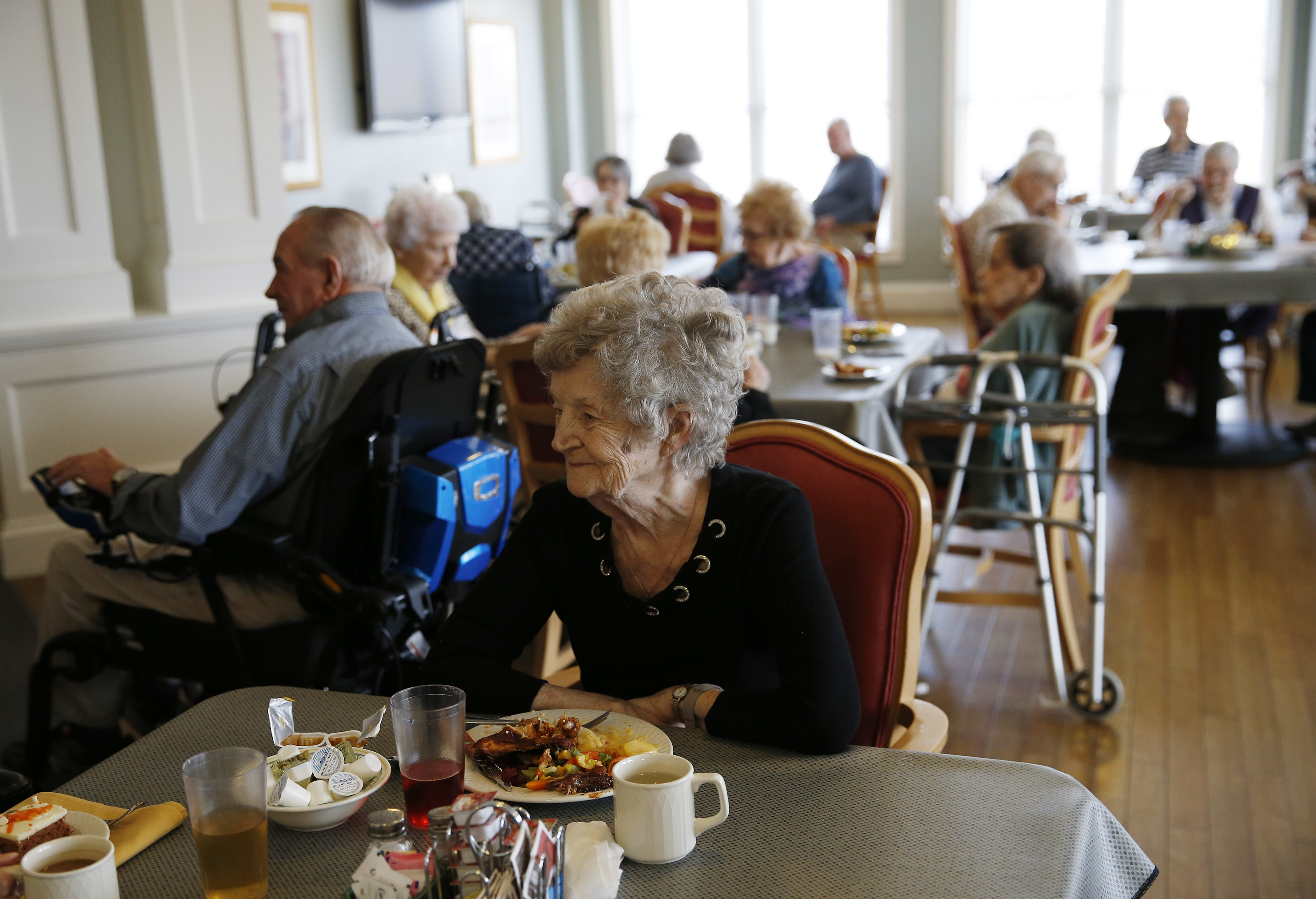 Roberta Rhodes ate lunch with friends and fellow residents at Christopher Heights.