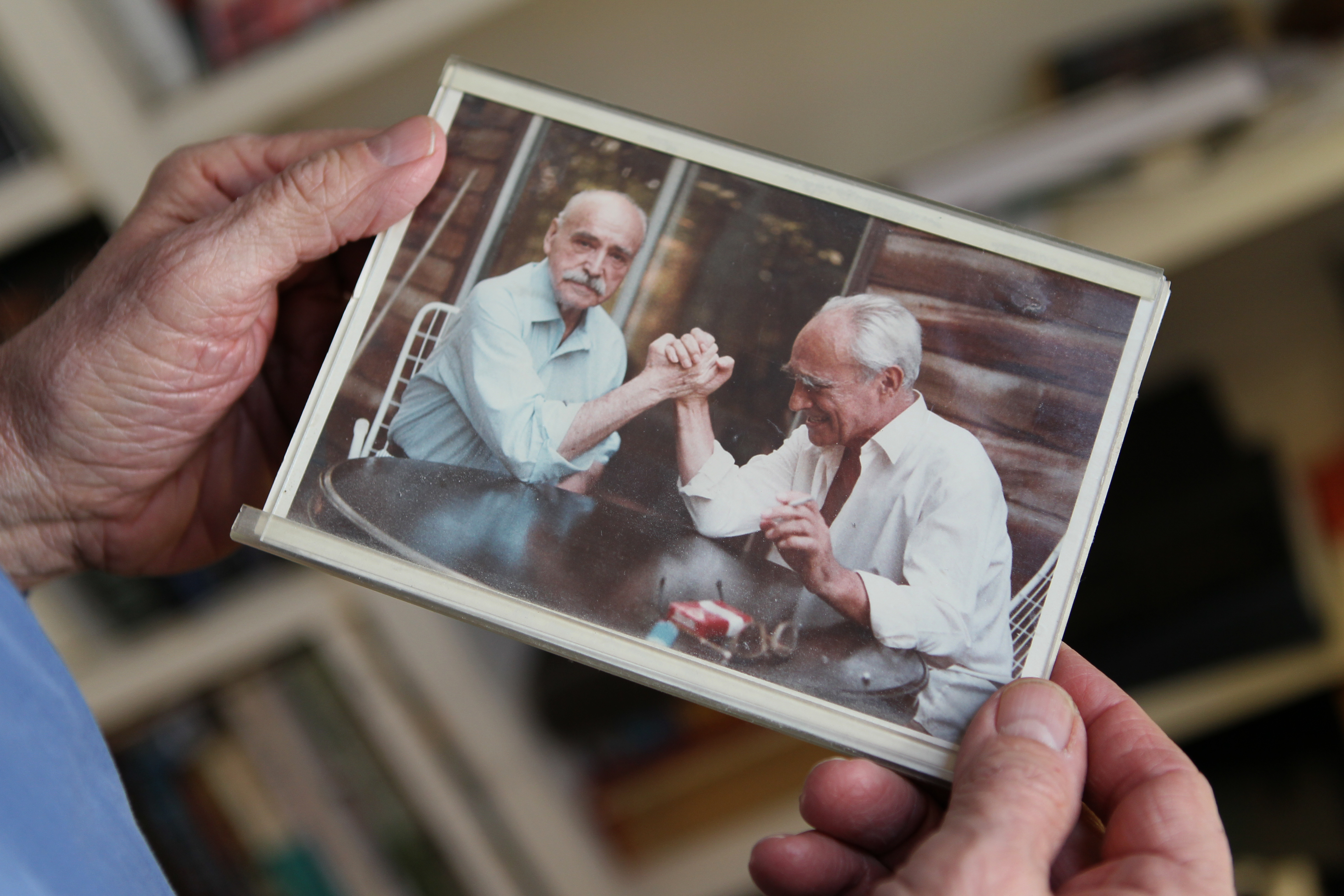 His dad (left) and uncle arm wrestling.