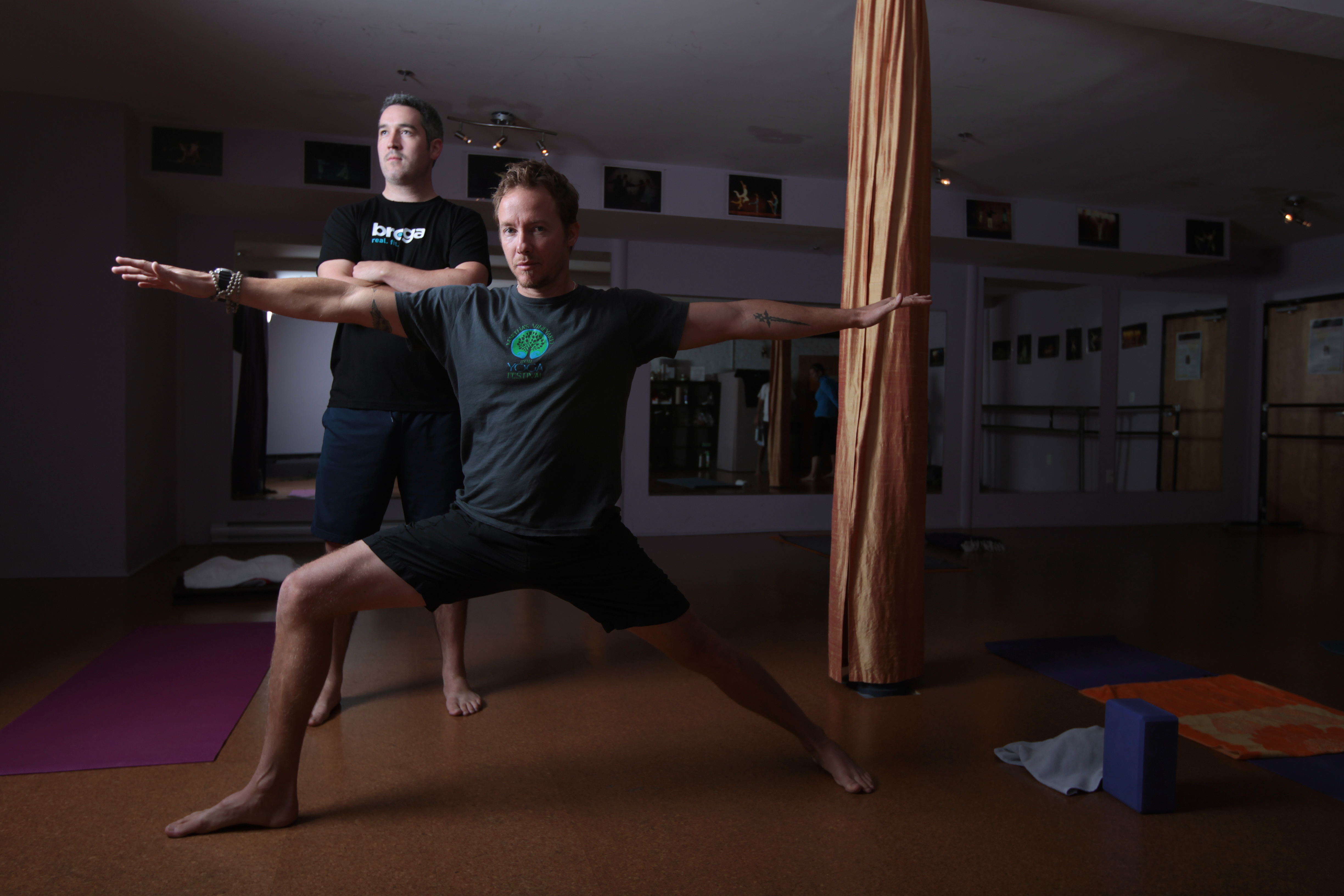 Broga cofounders Robert Sidoti (front) and Adam O'Neill were once reluctant to commit to yoga.
