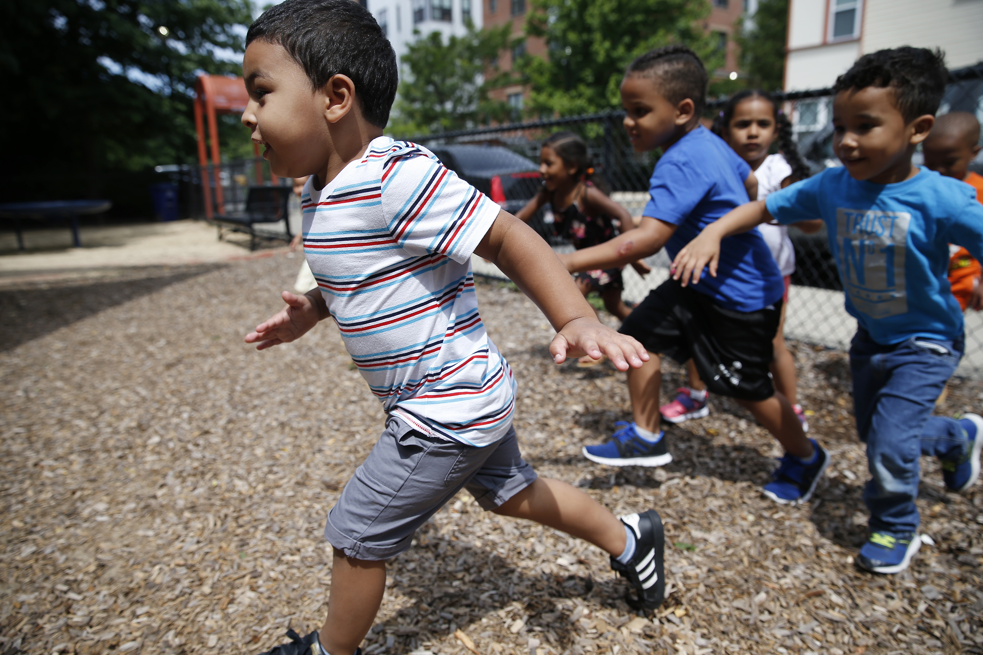 Ayden, 4, sprinted through the playground.(