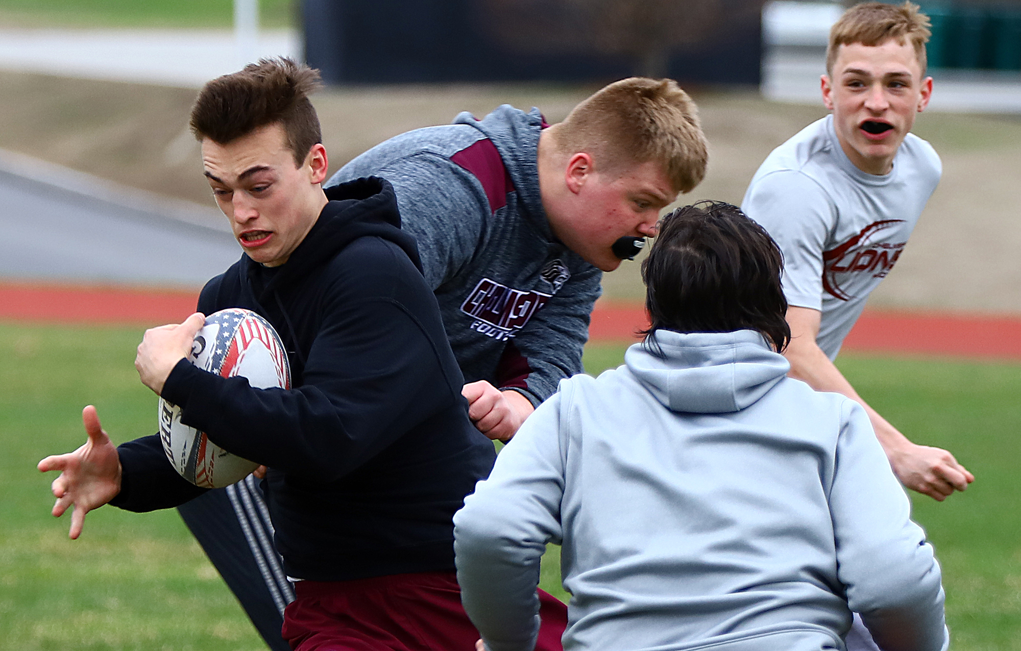 Clay Casaletto cuts upfield during rugby practice.