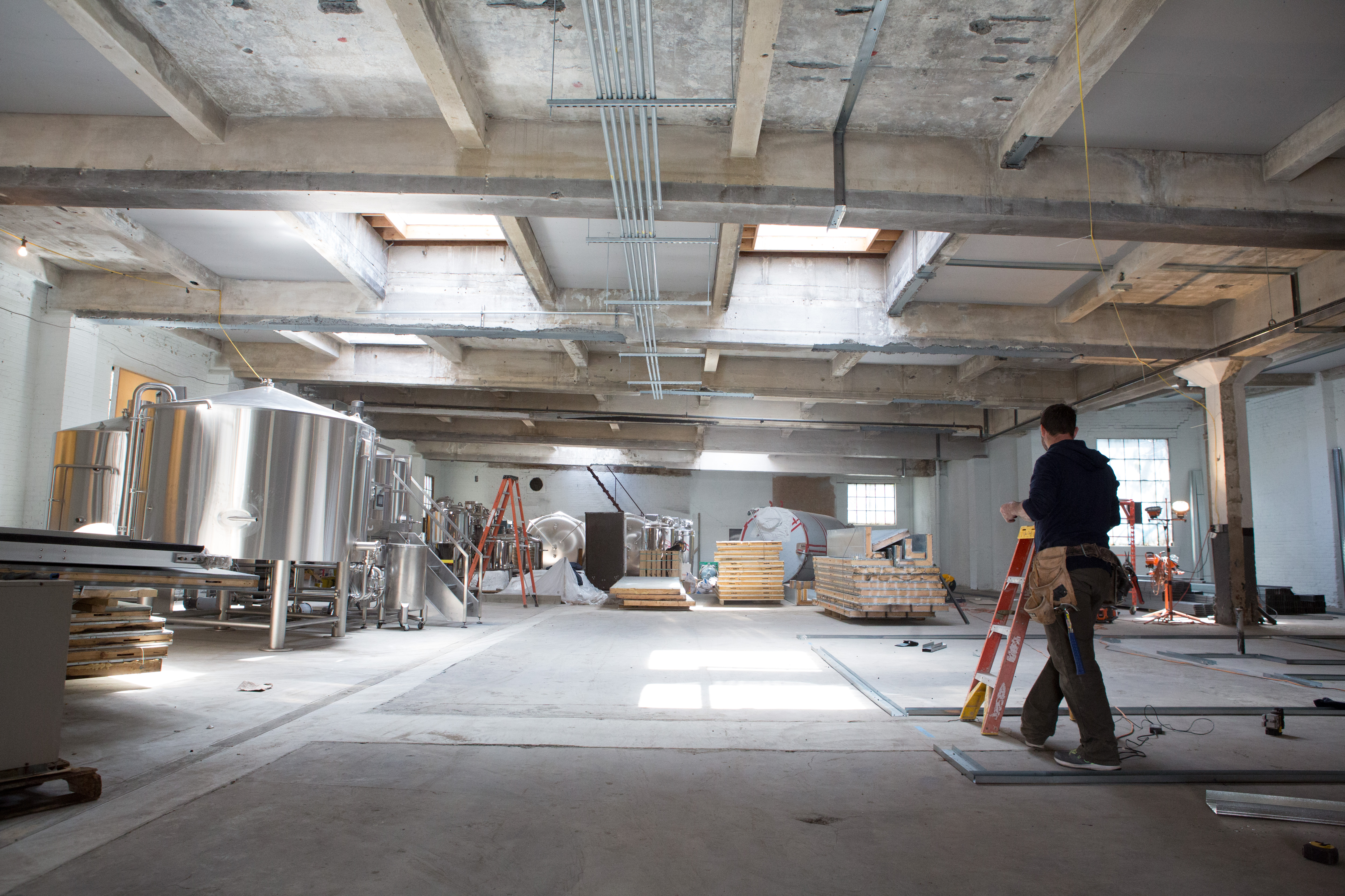 The Lamplighter team is transforming a former auto shop into a craft brewery.
