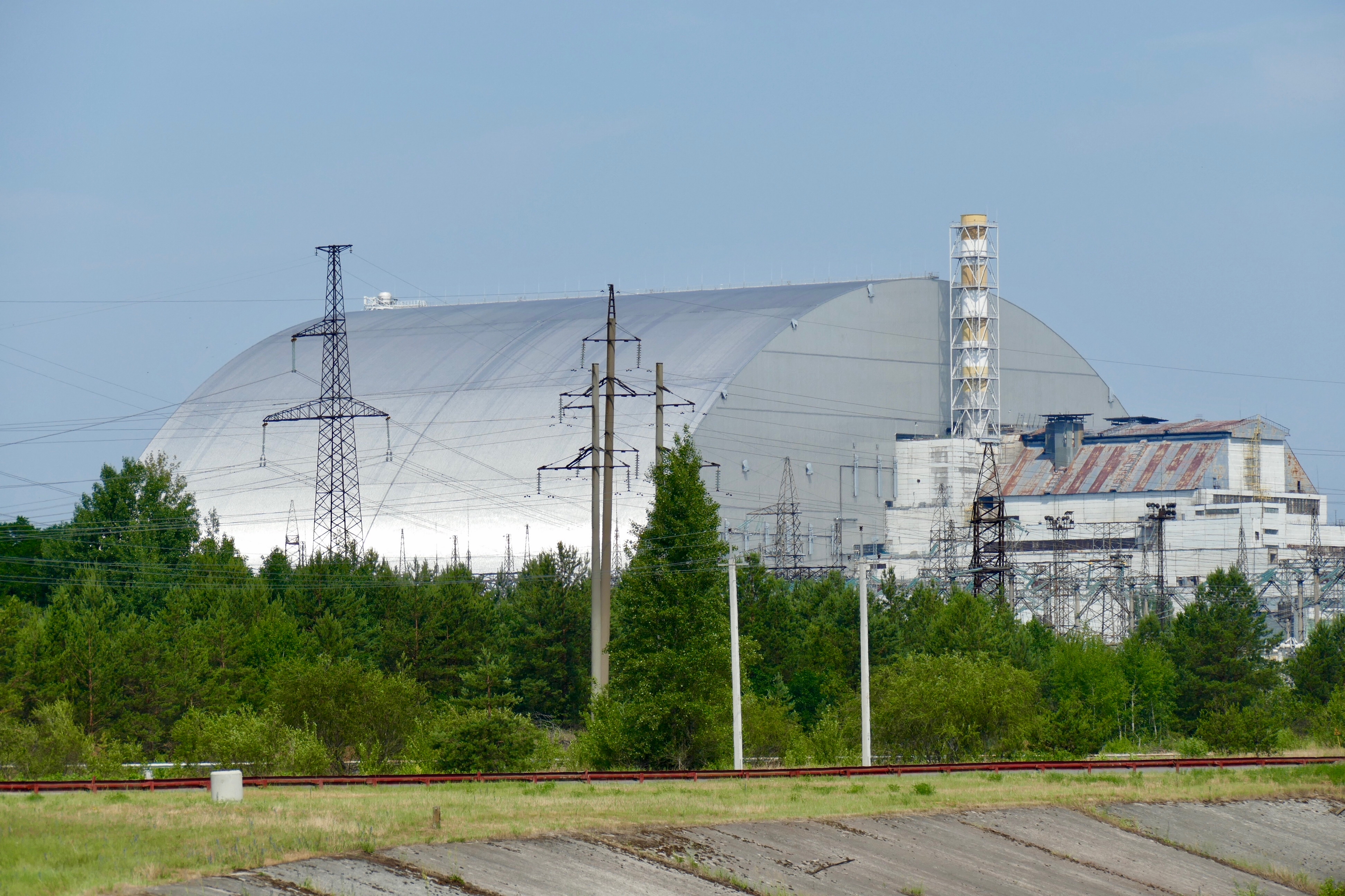 We ventured as close as permitted to the hulking New Safe Confinement, inched into place in 2016 and intended to isolate the still smoldering remains of Reactor 4 for a century.