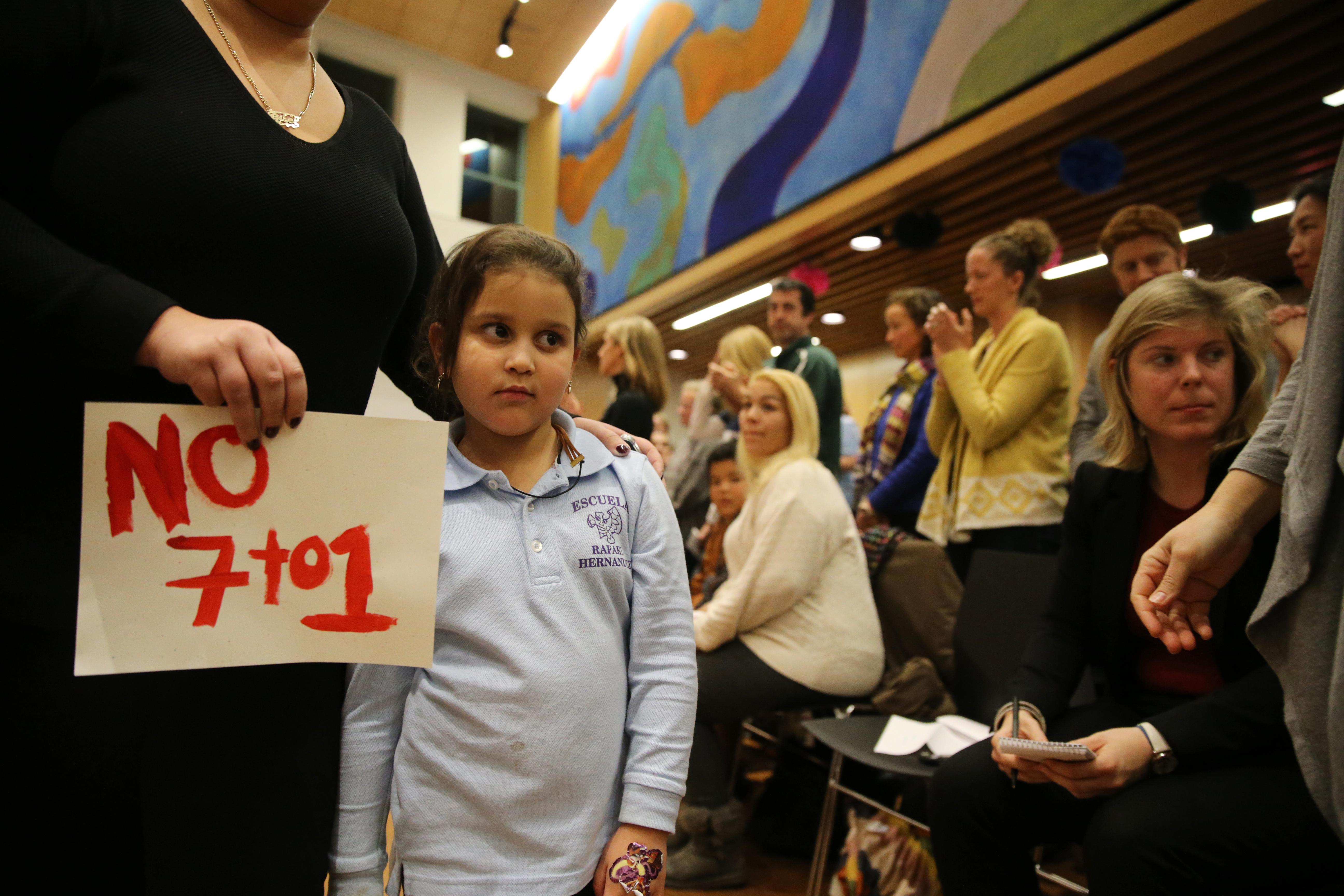 Gisel Pena and her daughter Chanelle, 5, returned to their seat after addressing the Boston School Committee at a meeting Wednesday about earlier start times for elementary and K-8 schools.