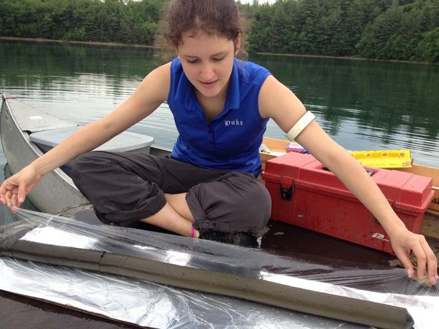 Researcher Maru Orbay-Cerrato collected a sediment core sample from a pond in Central Massachusetts. An analysis of pond sediments gave researchers a window into the ancient past.