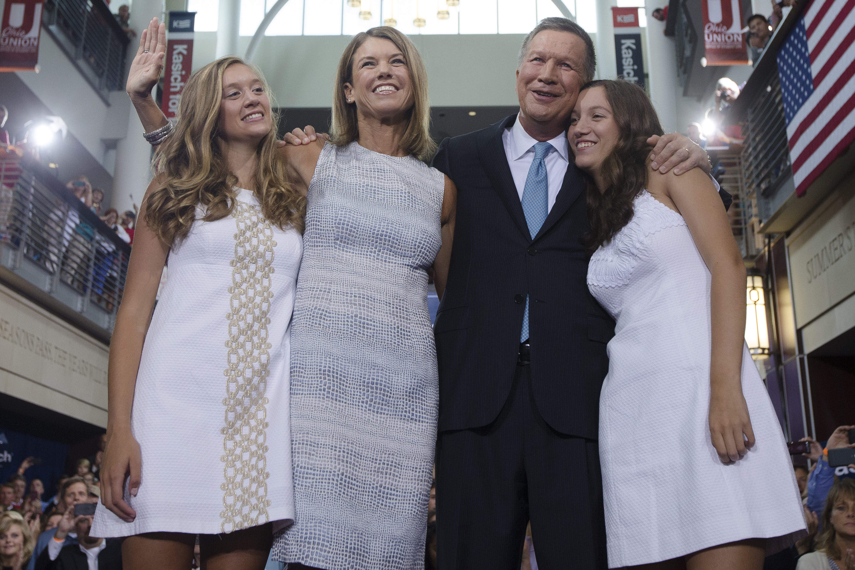 Kasich with his wife, Karen and daughters Reese (right) and Emma after announcing his run in Ohio on Tuesday.