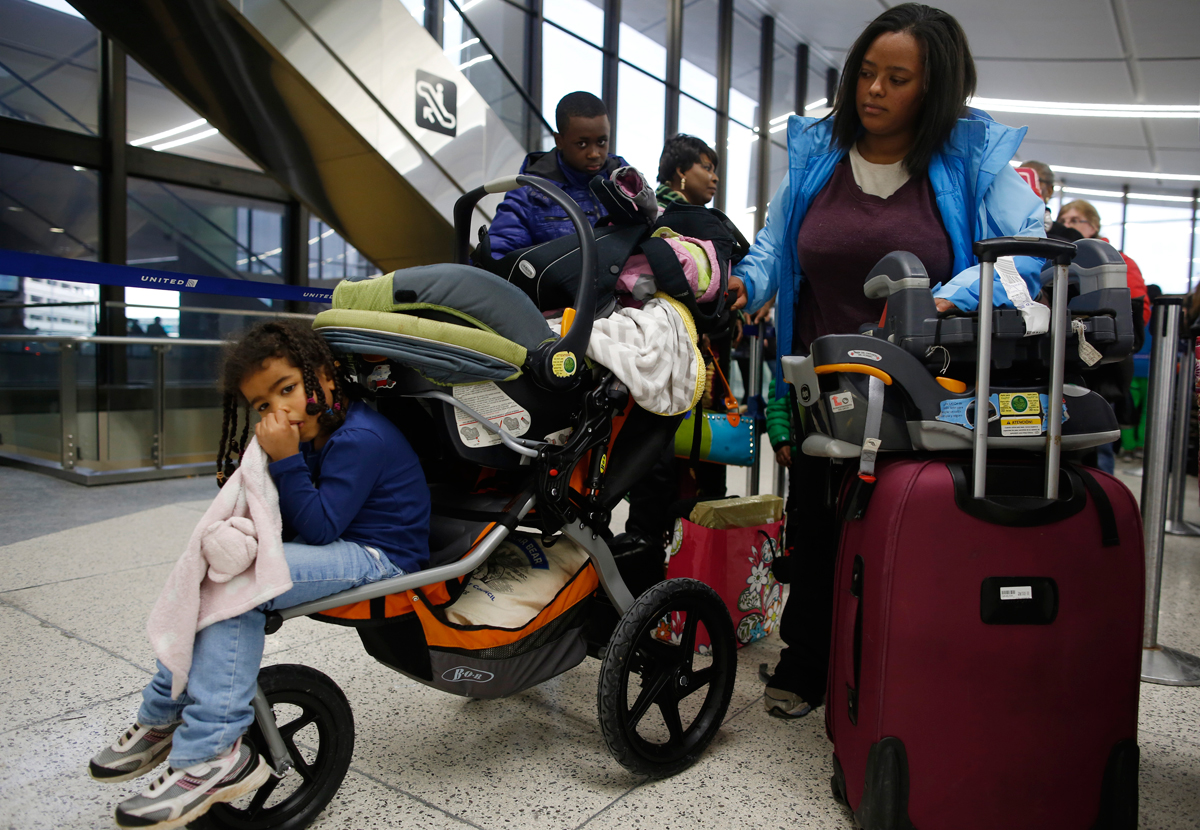 Muli Klarman, at Logan International Airport in Boston, had her flight home to Washington with her two children delayed on Saturday and again Sunday.