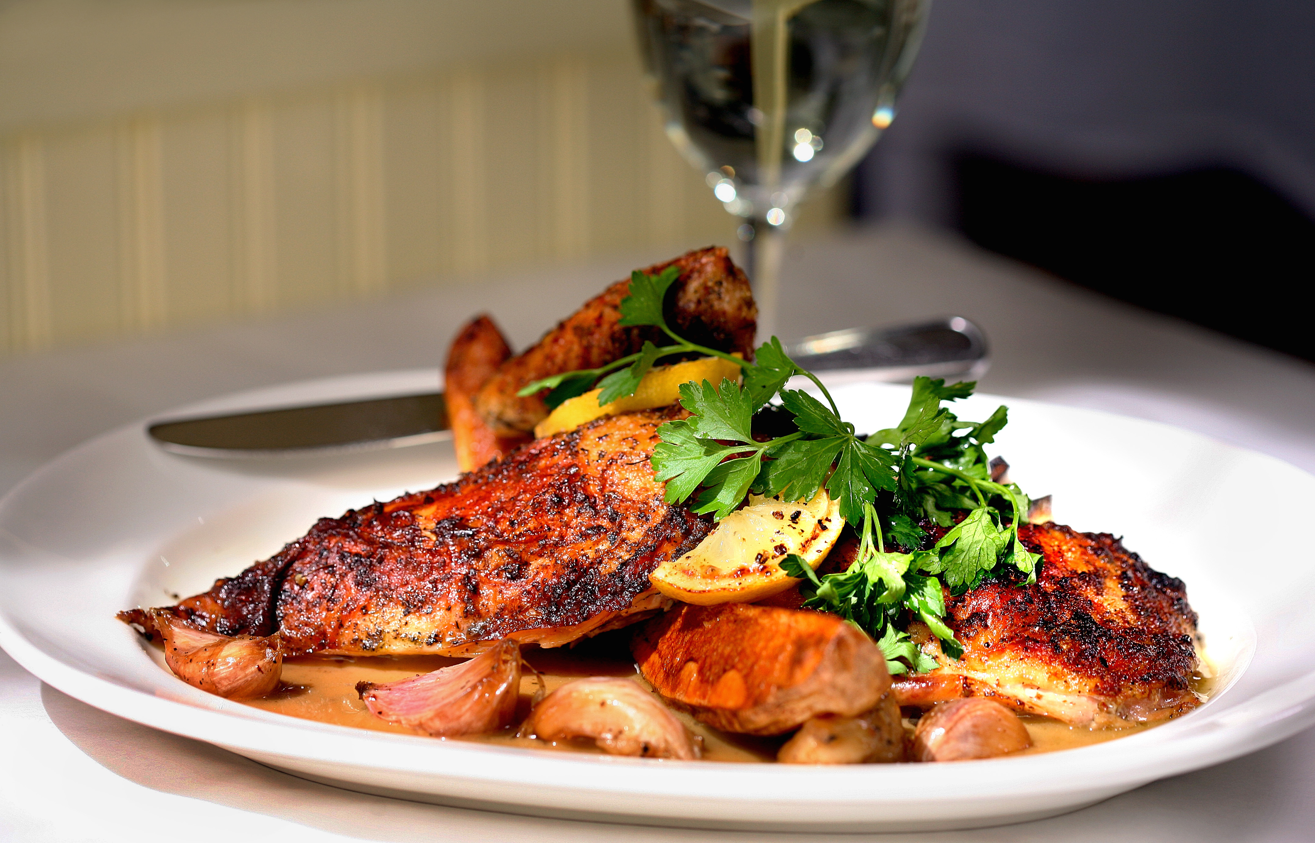 Roasted chicken with garlic, lemon, and parsley.