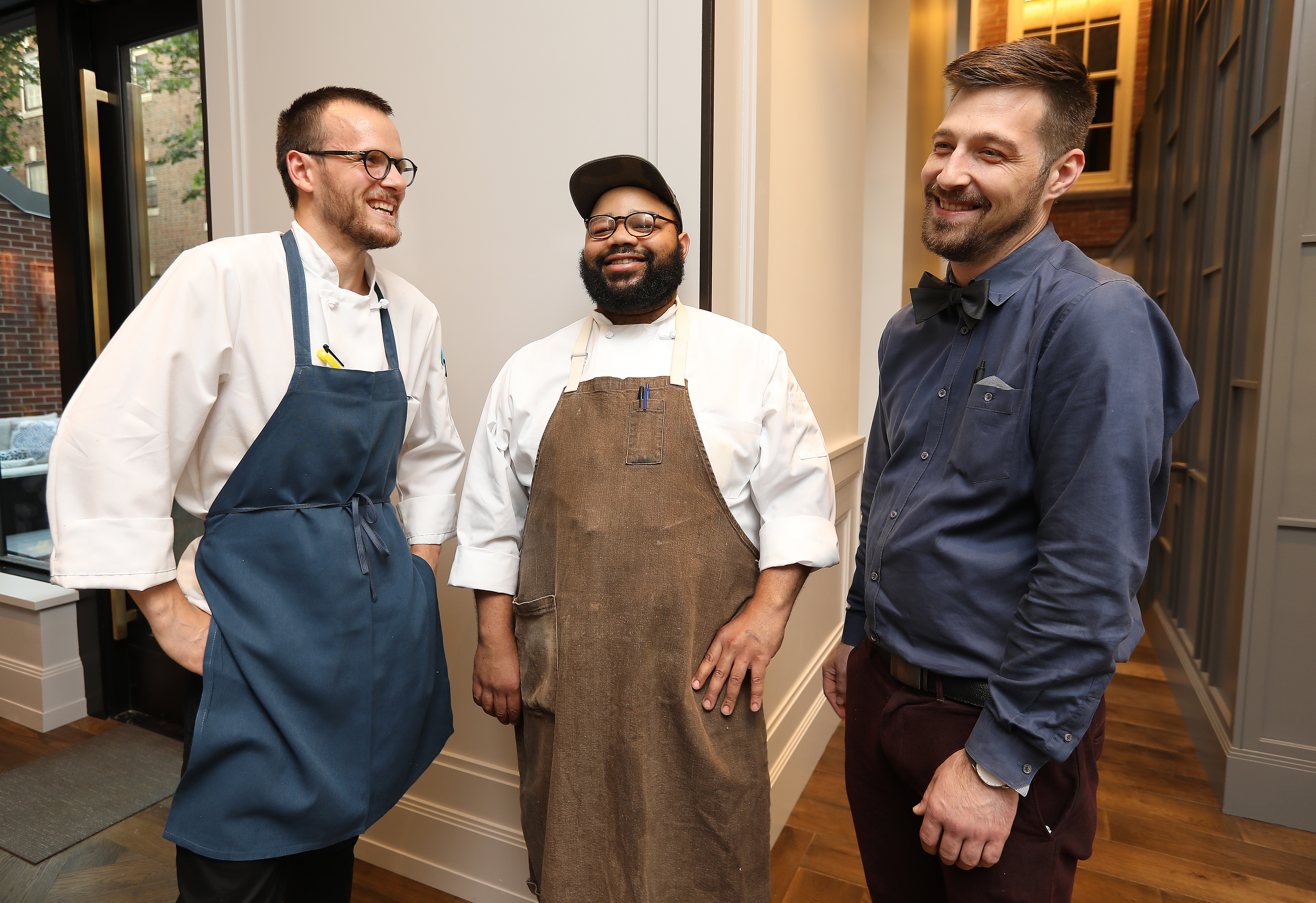 From left to right: Sous chef Will Deeks, executive sous chef Matt Bullock, and service manager Joseph Rinaldi.