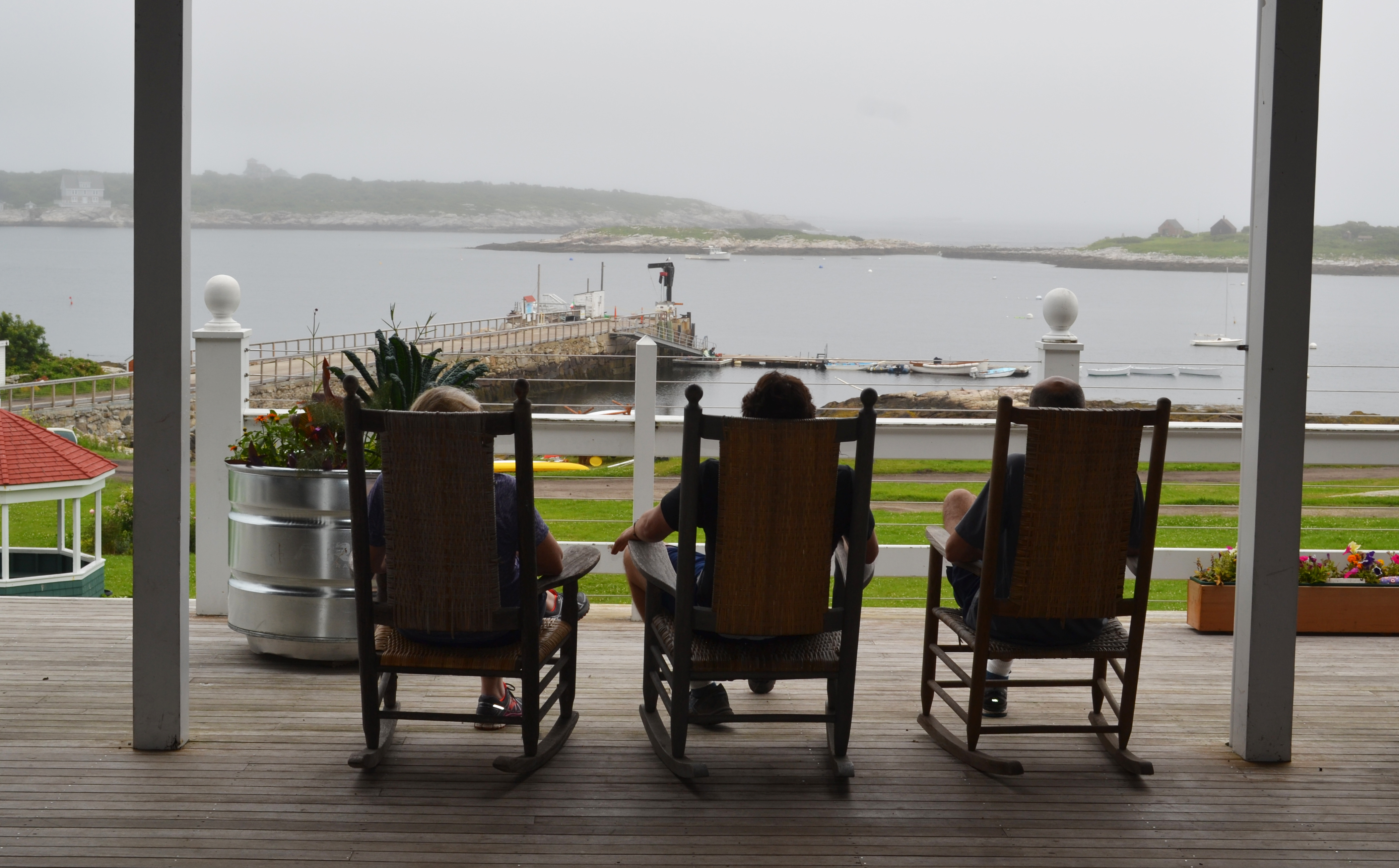 The Oceanic Hotel has a wraparound porch with water views.
