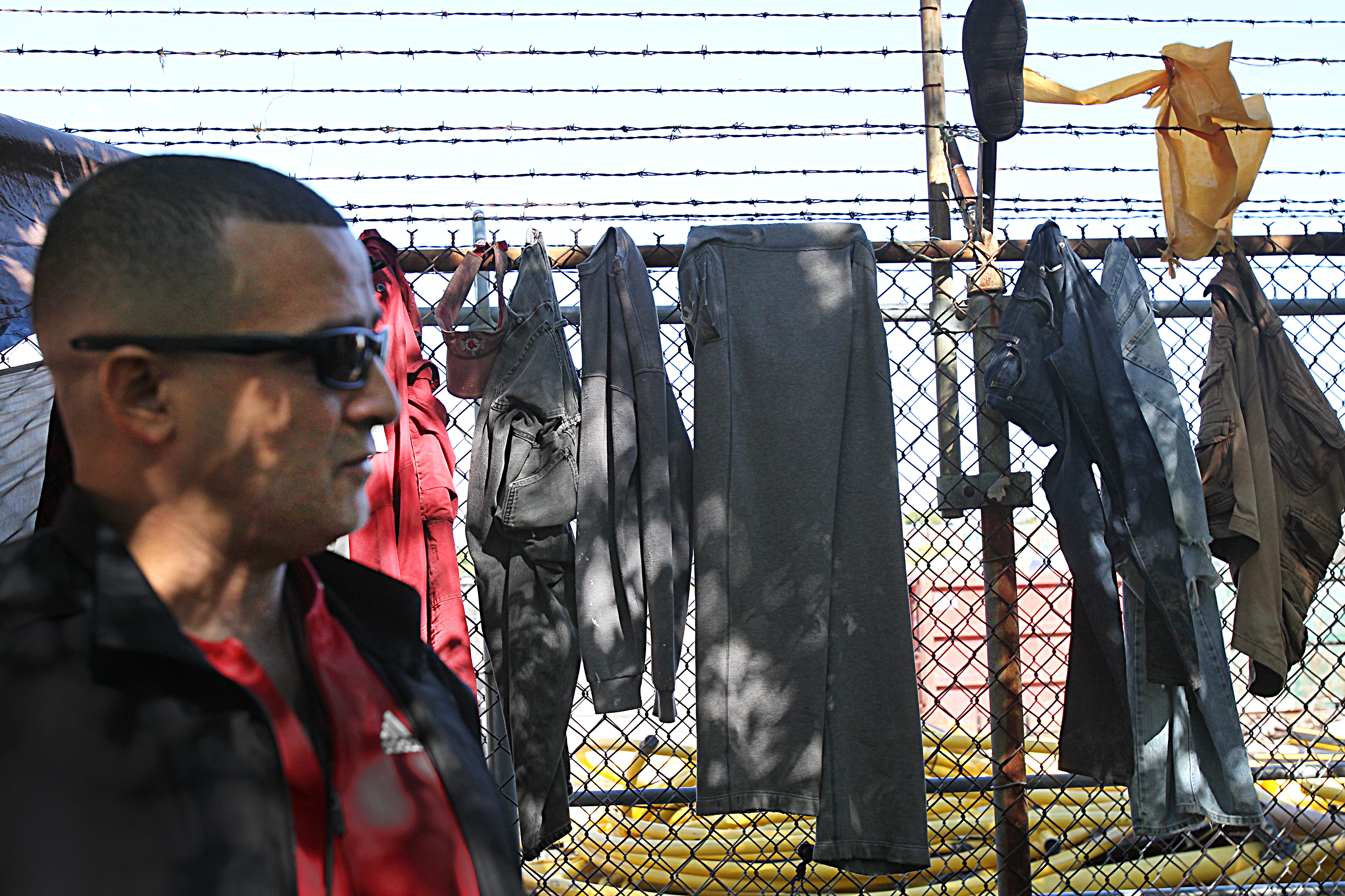 Diaz looked on last week during a stop at the camp. Many of the addicts are leery of shelters and halfway houses, and some are avoiding probation officers.