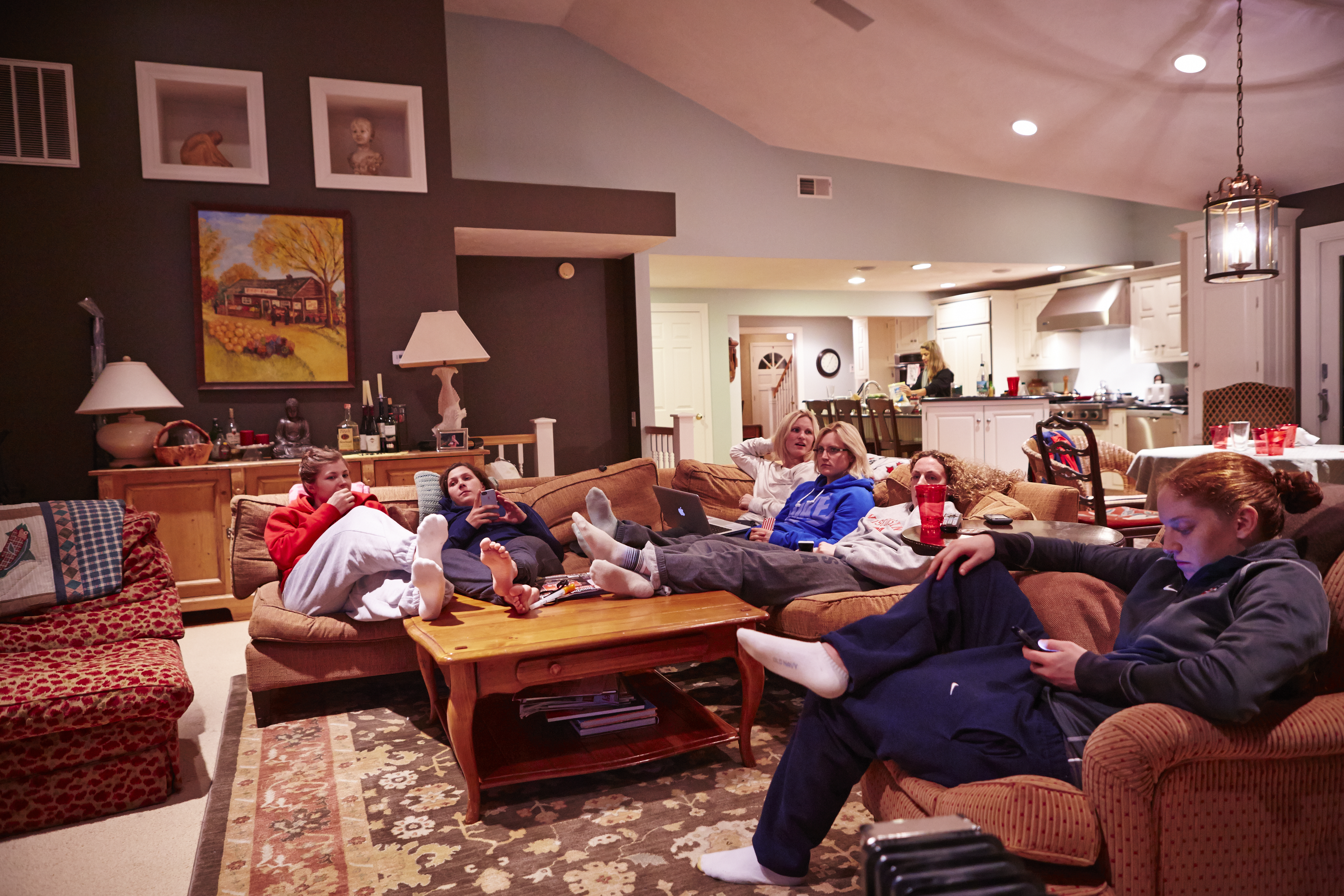 After burritos, Schleper, Bozek, twins Jocelyne and Monique Lamoureux, Vetter, and Schaus kick back at the Millers.