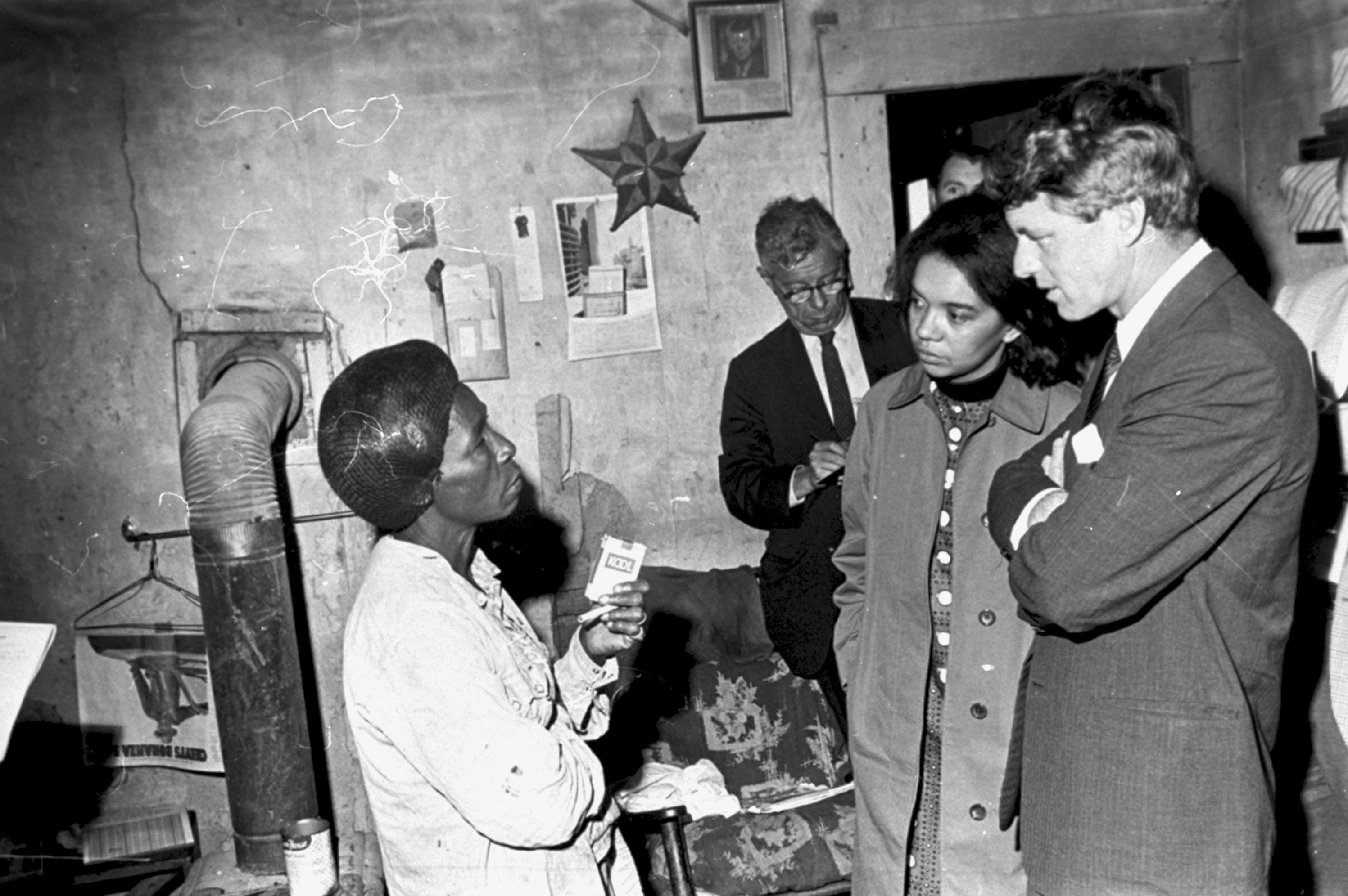 Kennedy stood with Marian Wright Edelman (second from right) as they visited Greenville, Miss., during an anti-poverty investigation in 1967.